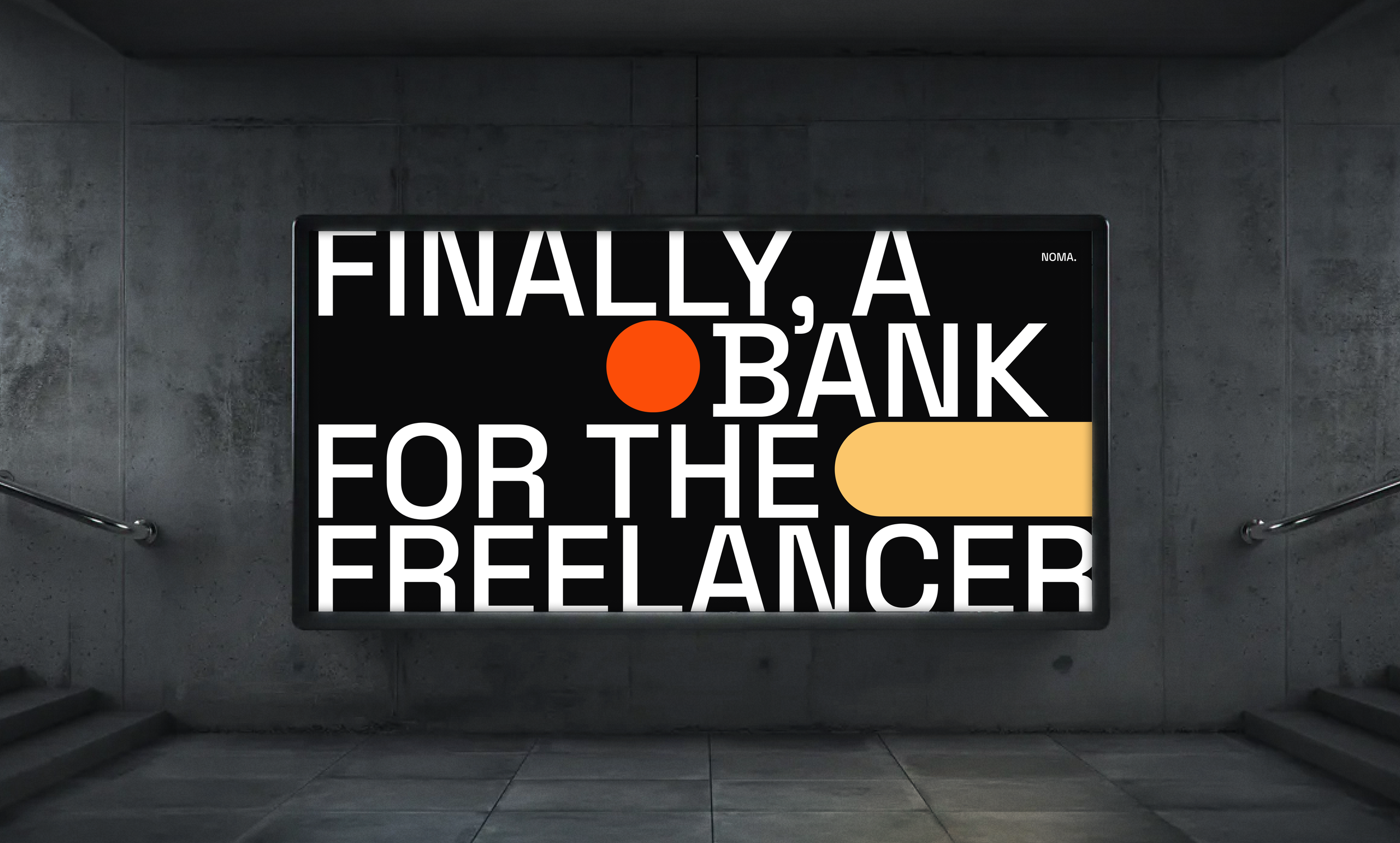 A digital sign on a concrete wall that reads, "Finally, a bank for the freelancer," with the words arranged in large white letters, an orange circle, and a beige shape.