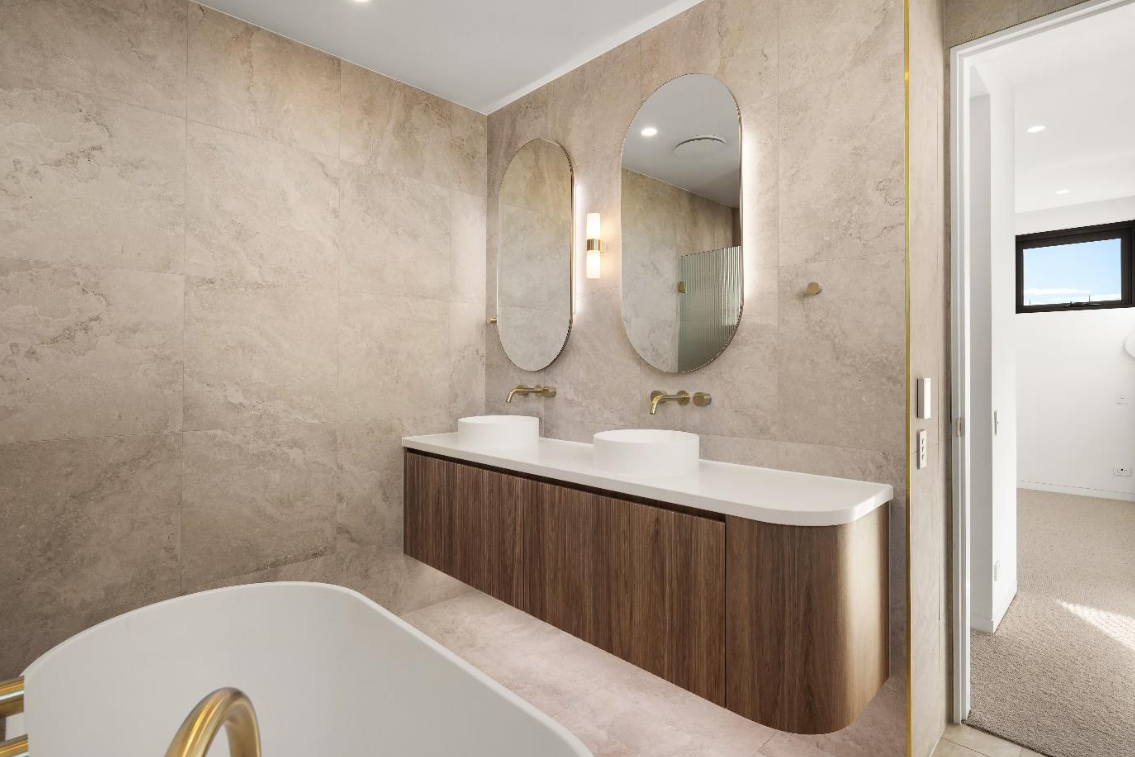 Dudley St Ensuite bathroom and stone tiling.png