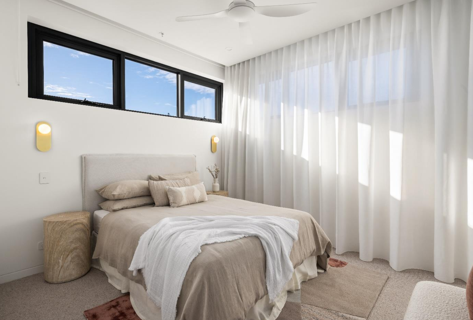 Dudley St bedroom with drapes and pelmets.png