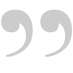 black quotation marks on white background