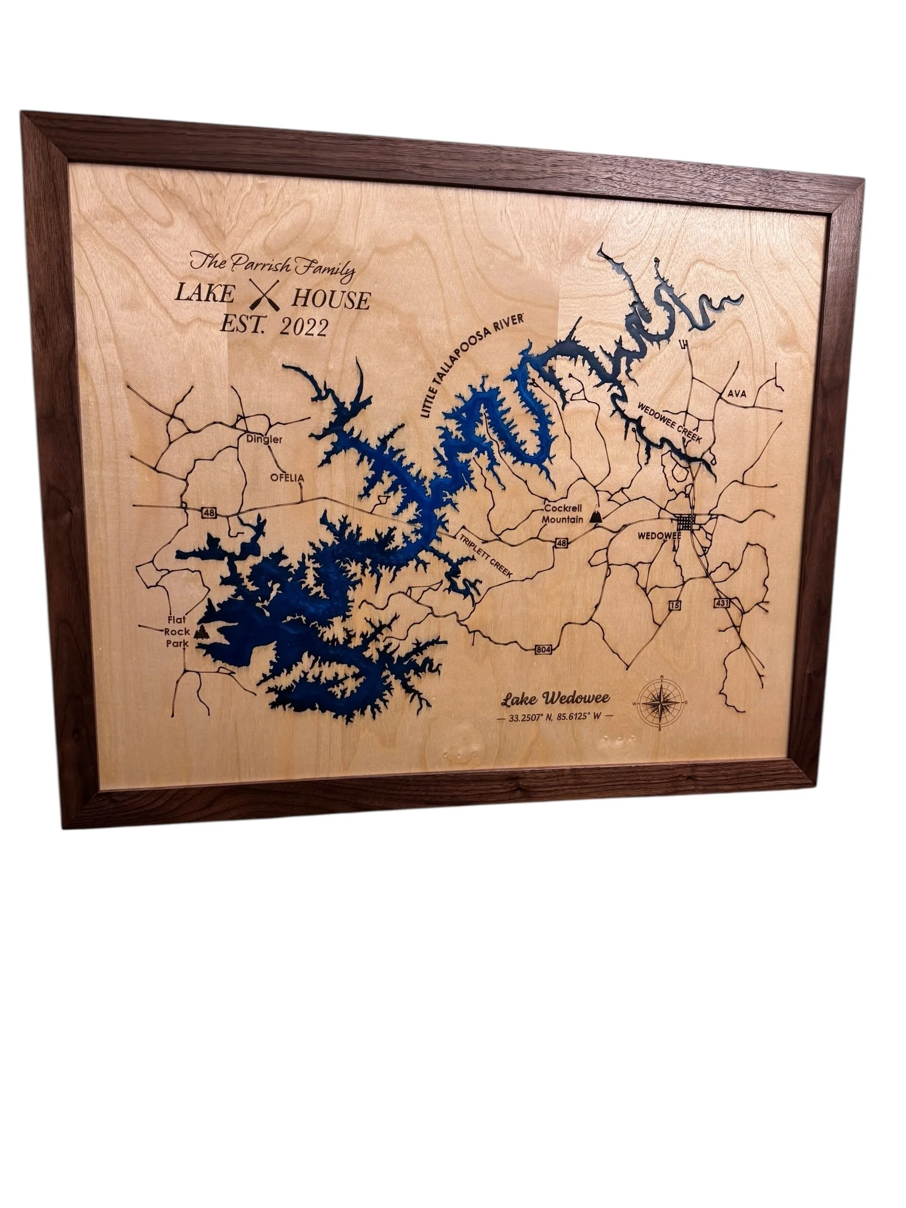 Wooden framed map of Lake Wedowee, showing surrounding roads, creeks, and geographical features with a custom caption.