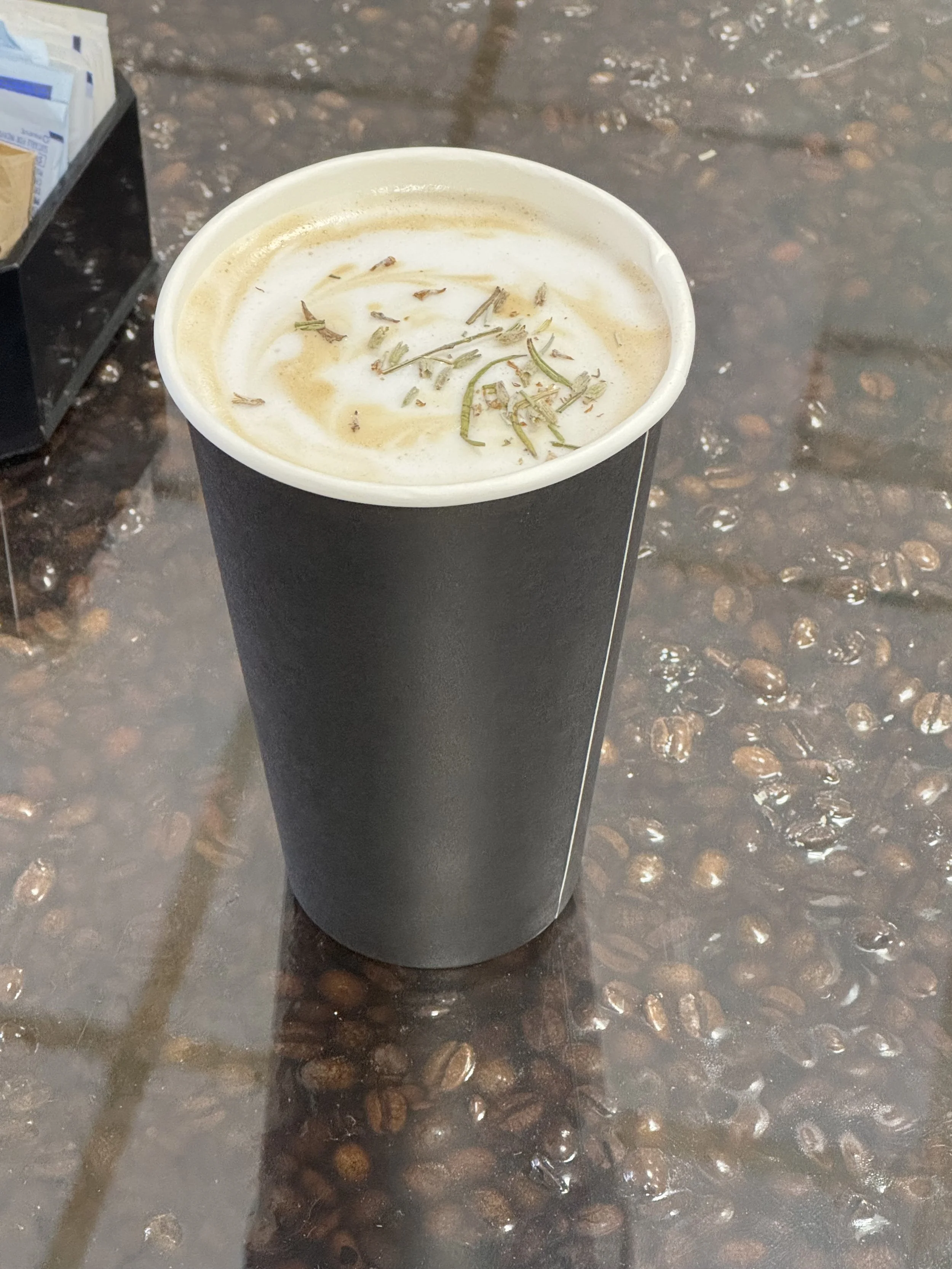 Hot latte with rosemary 