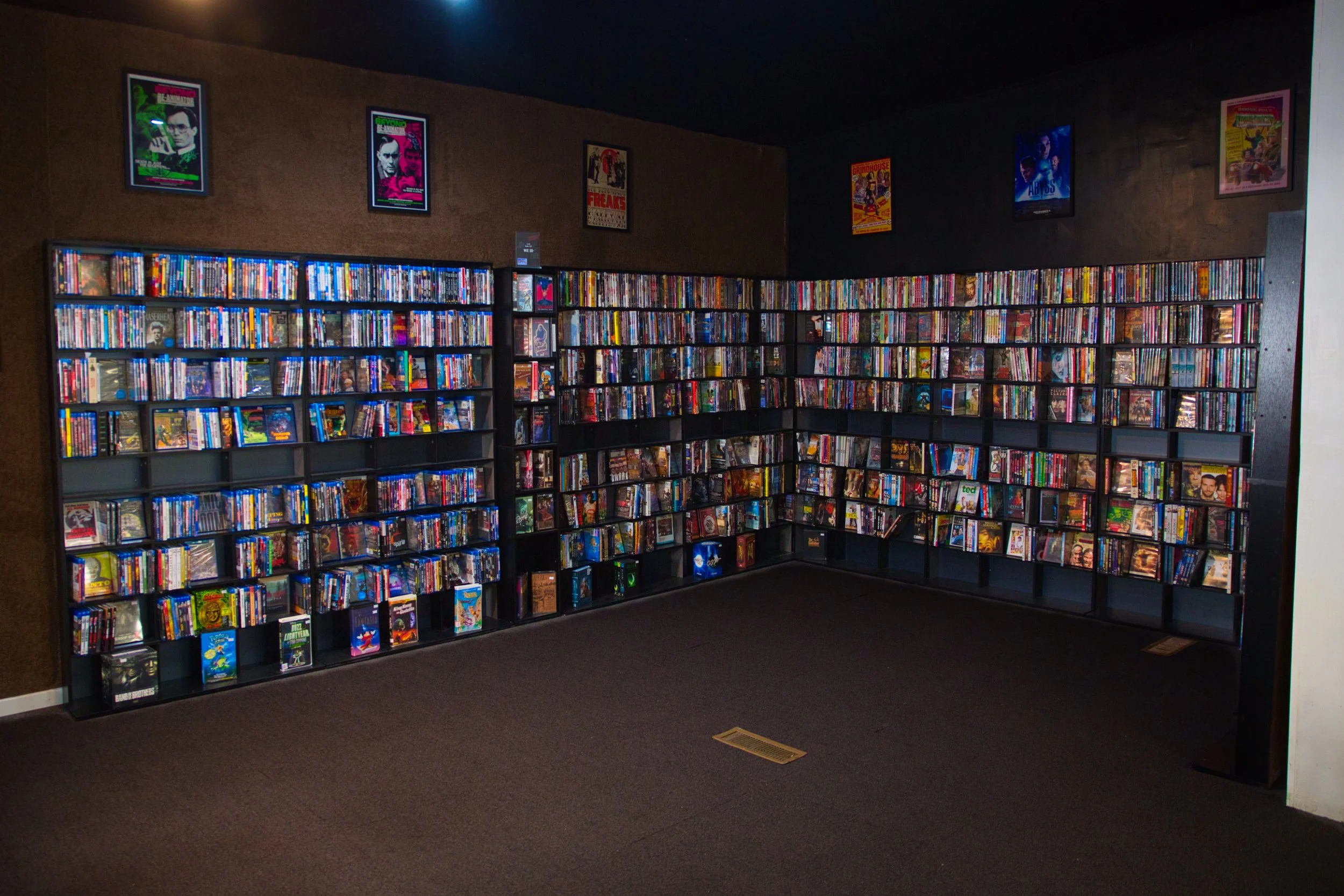 Bookshelf filled with Blu Rays and DVDs 