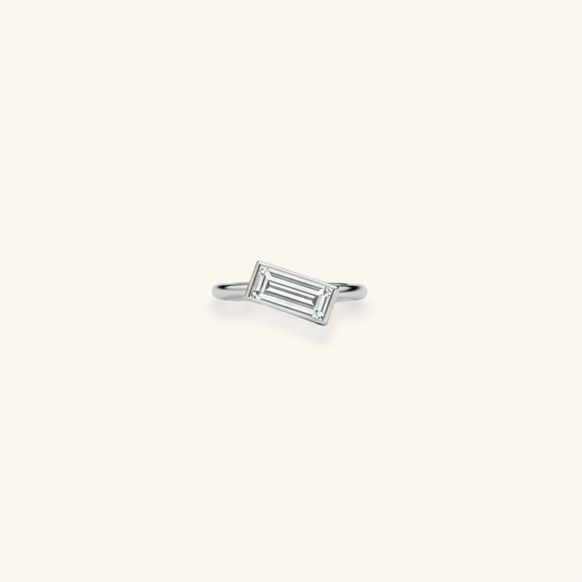 Silver ring with a rectangular, emerald-cut clear gemstone