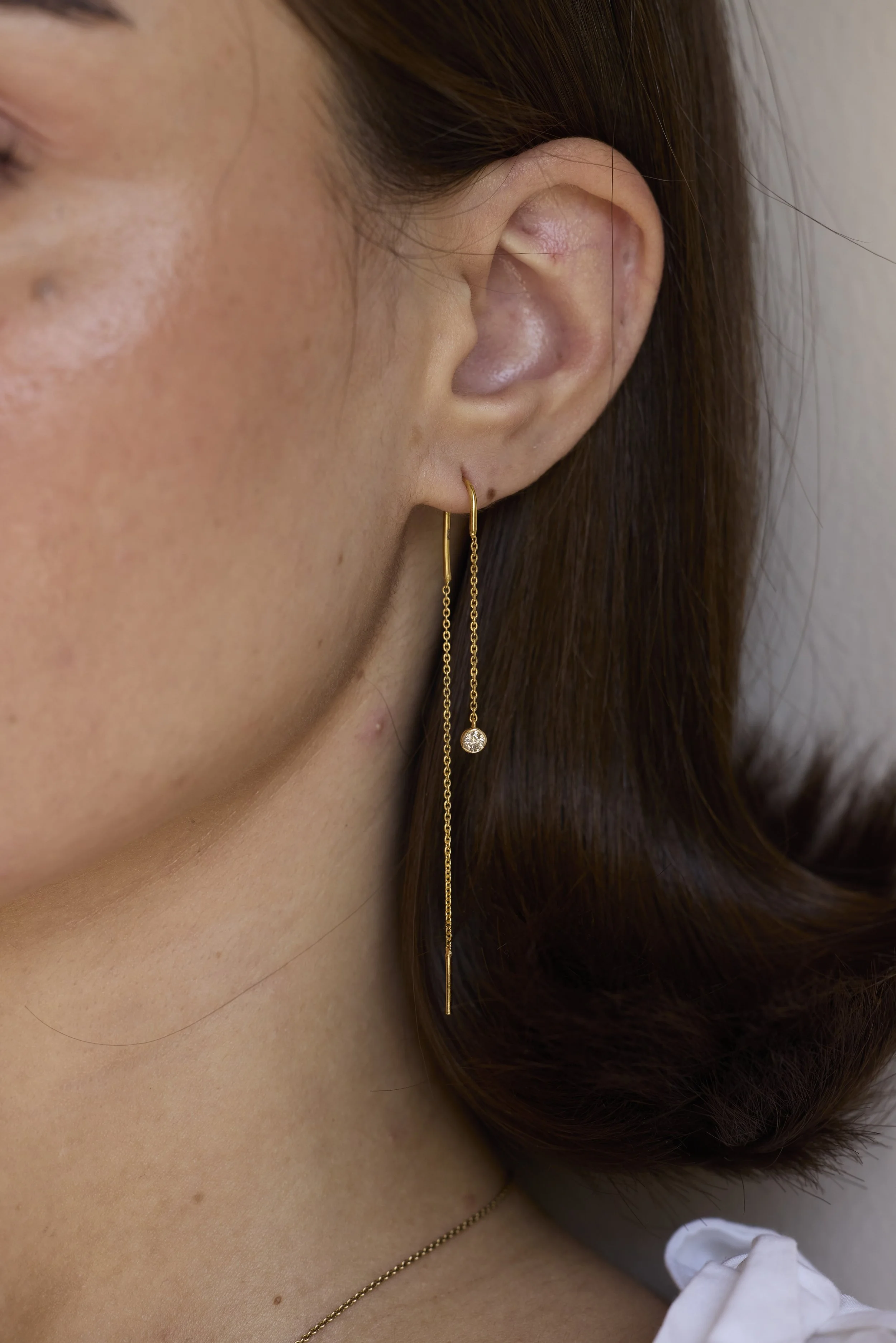 14K Solid gold bezel diamond threader earrings featuring hand-cut diamonds on fine gold chains by Zikr Fine Jewelry.