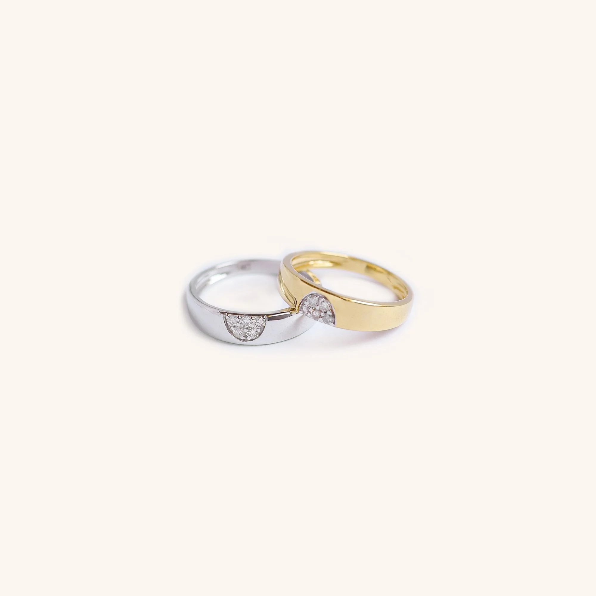 Dual 14K gold rings with diamond clusters, versatile by Zikr Fine Jewelry.
