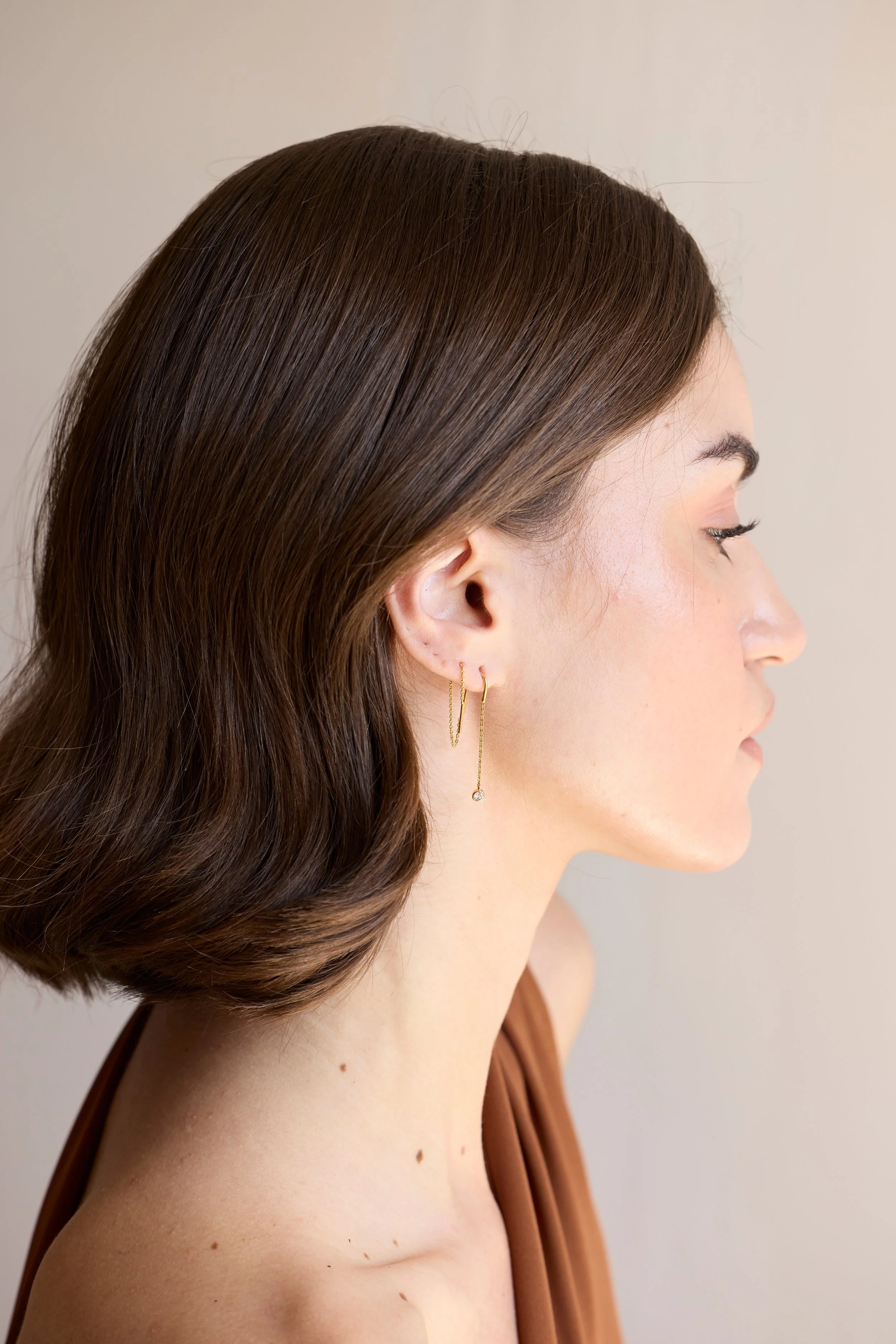 14K Solid gold bezel diamond threader earrings featuring hand-cut diamonds on fine gold chains by Zikr Fine Jewelry.