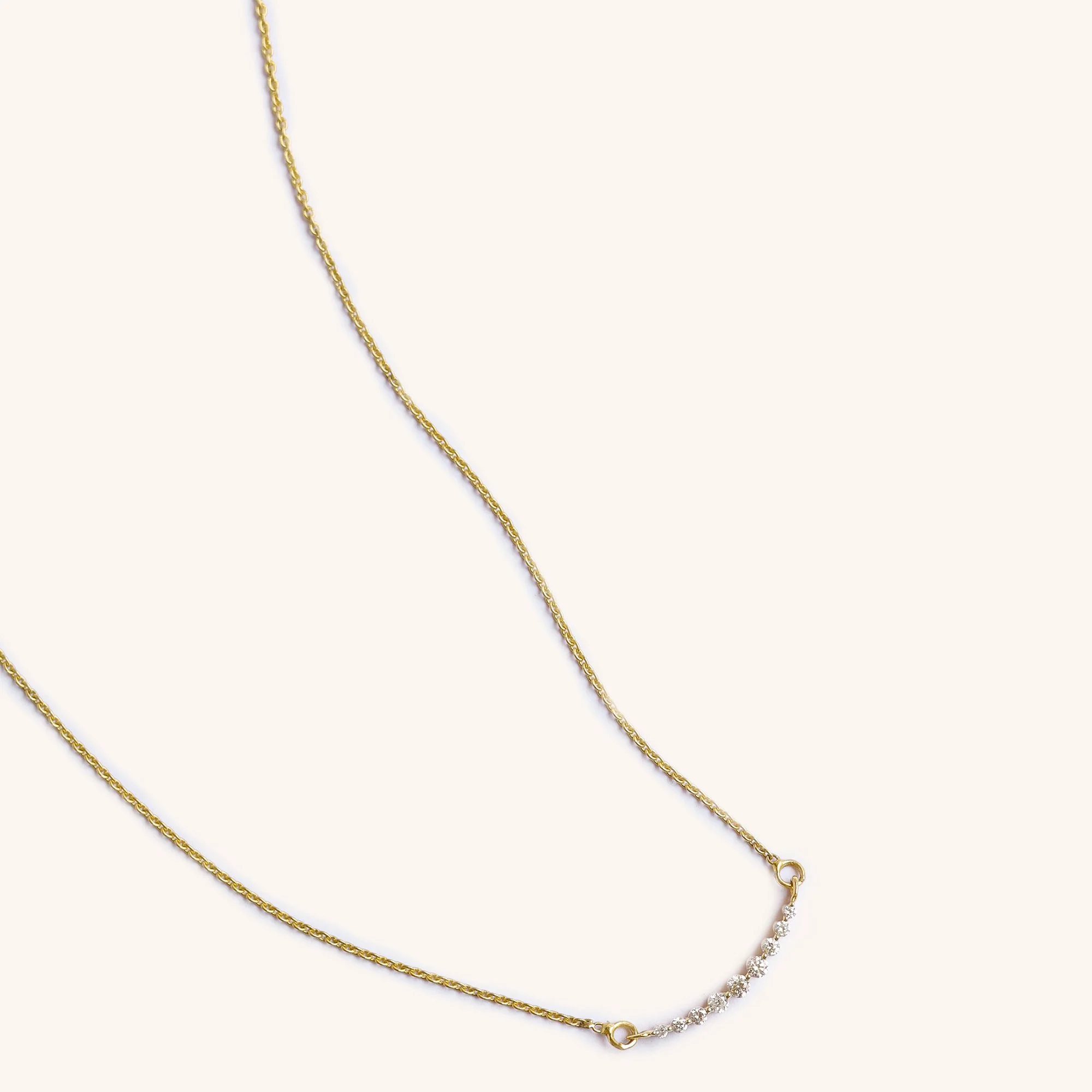 Mini Tennis 14K Diamond Necklace – Solid gold necklace with 9 evenly set diamonds in a delicate line, crafted for soft sparkle and daily elegance.