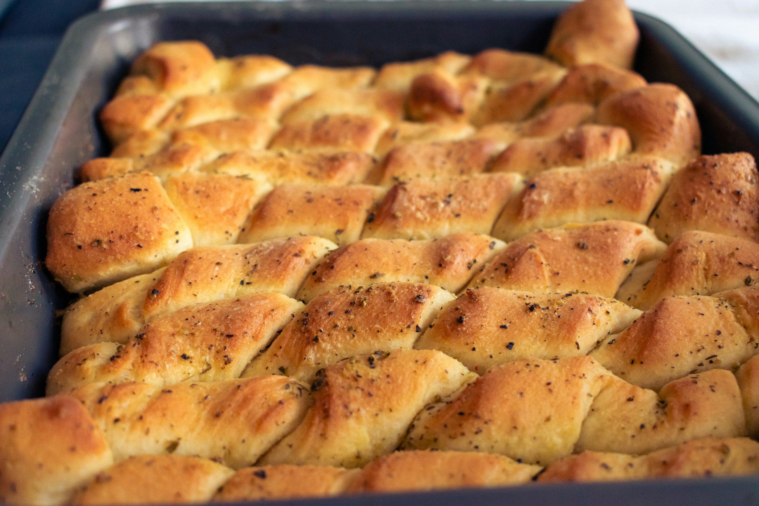 Freshly baked restaurant bread rolls showing a high-value, low-cost menu item