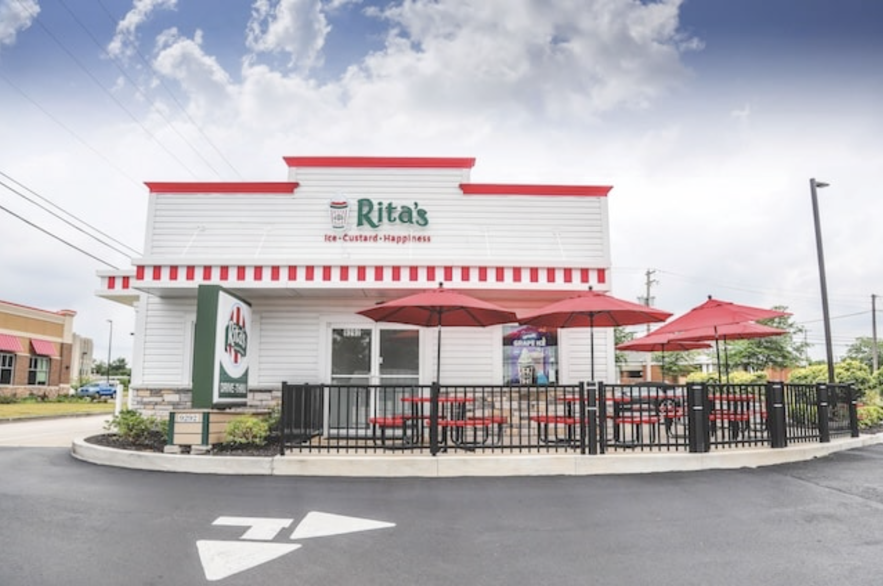 Rita's Italian Ice Restaurant with tables and umbrellas