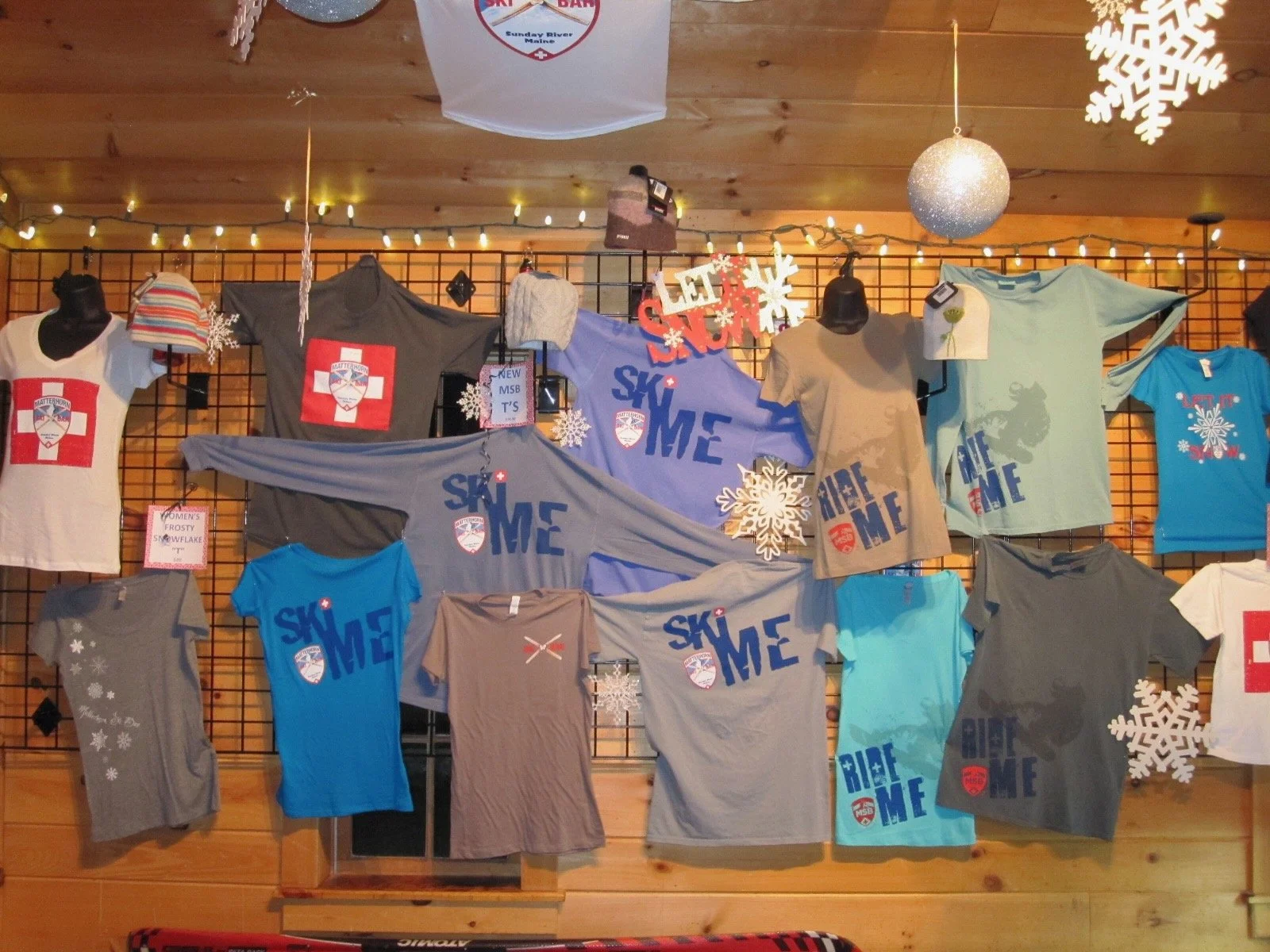 Restaurant branded T-shirts and merchandise displayed for sale