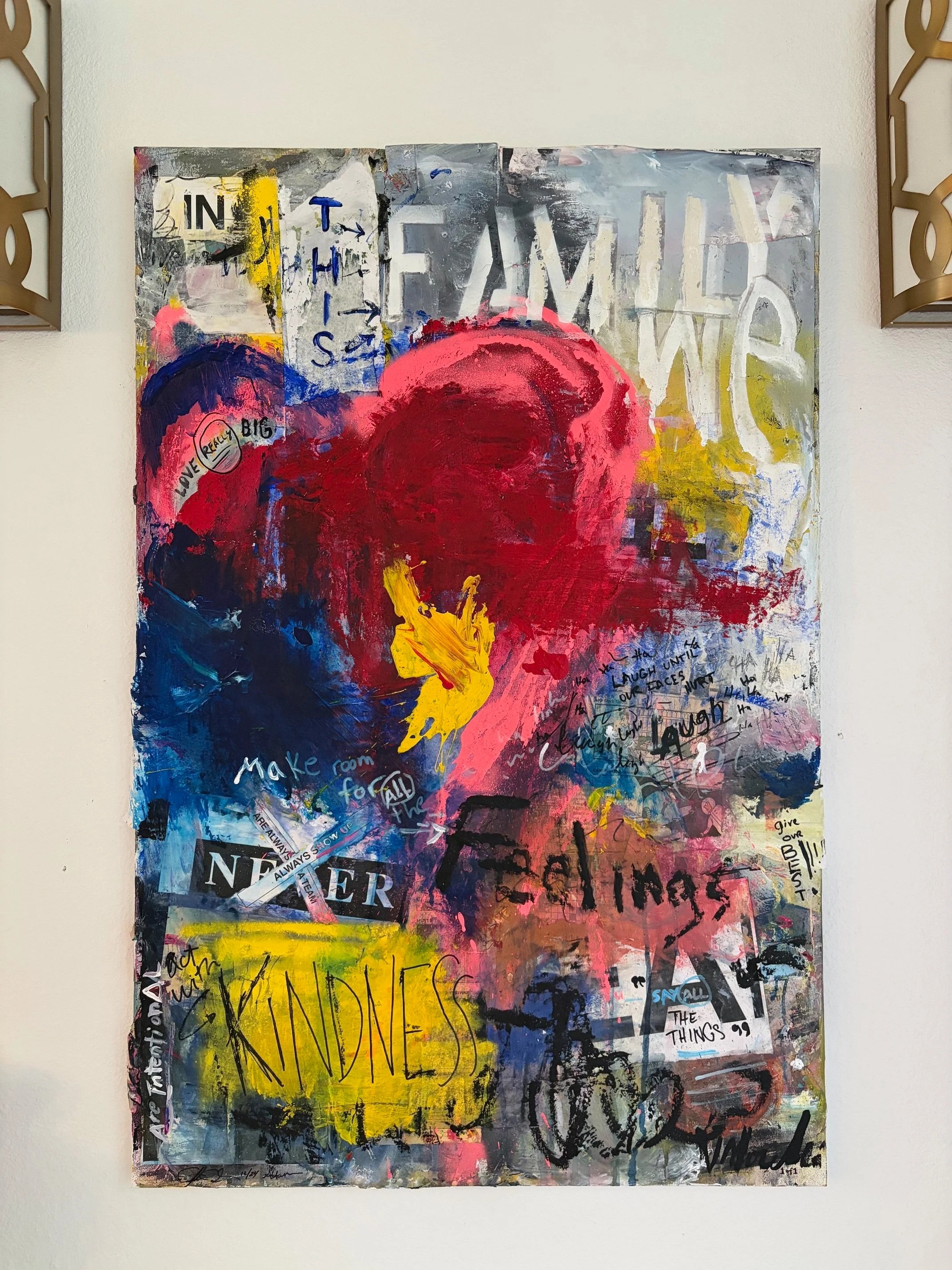 Family rules painting used to inspire Amber and Chris’s DIY wedding ceremony