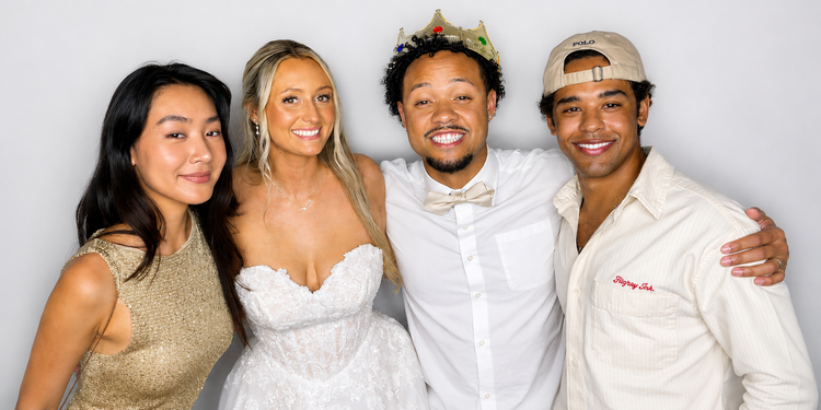 Friends celebrating together in a CheesyPix photo booth
