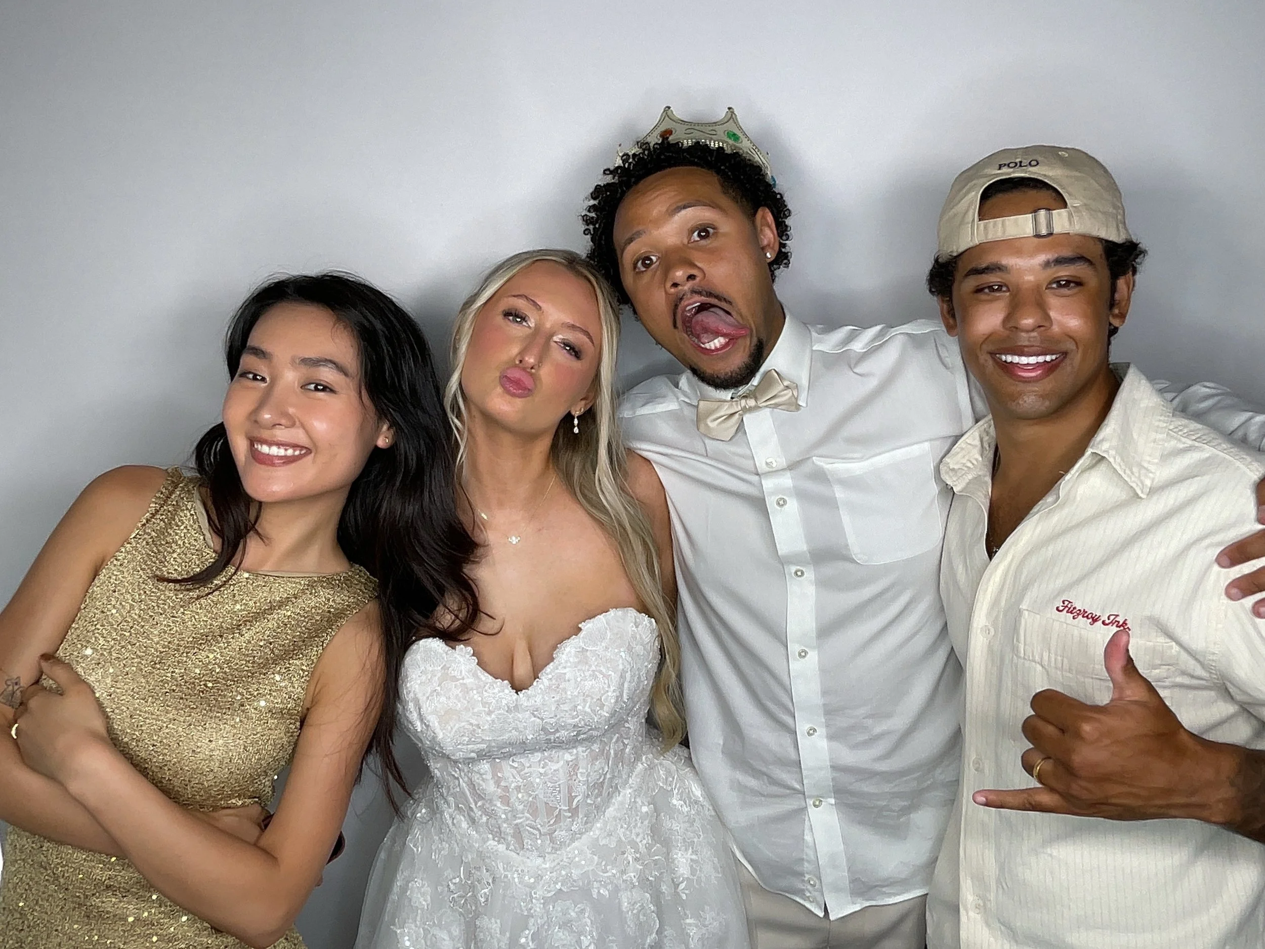 Guests enjoying a CheesyPix photo booth experience