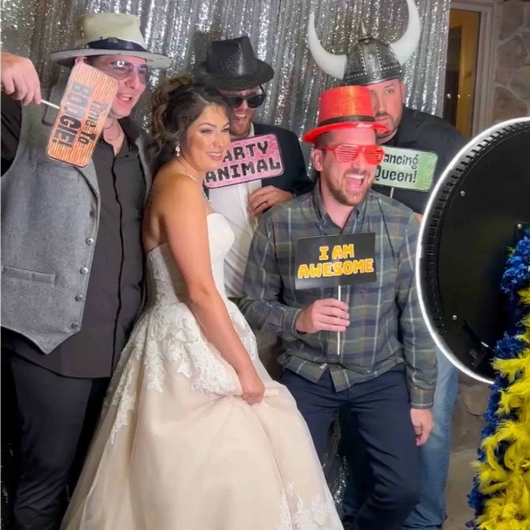 Wedding party having fun at a CheesyPix photo booth
