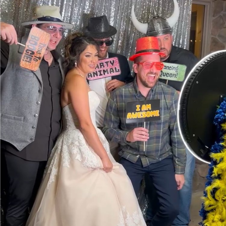 Wedding guests at a photo booth