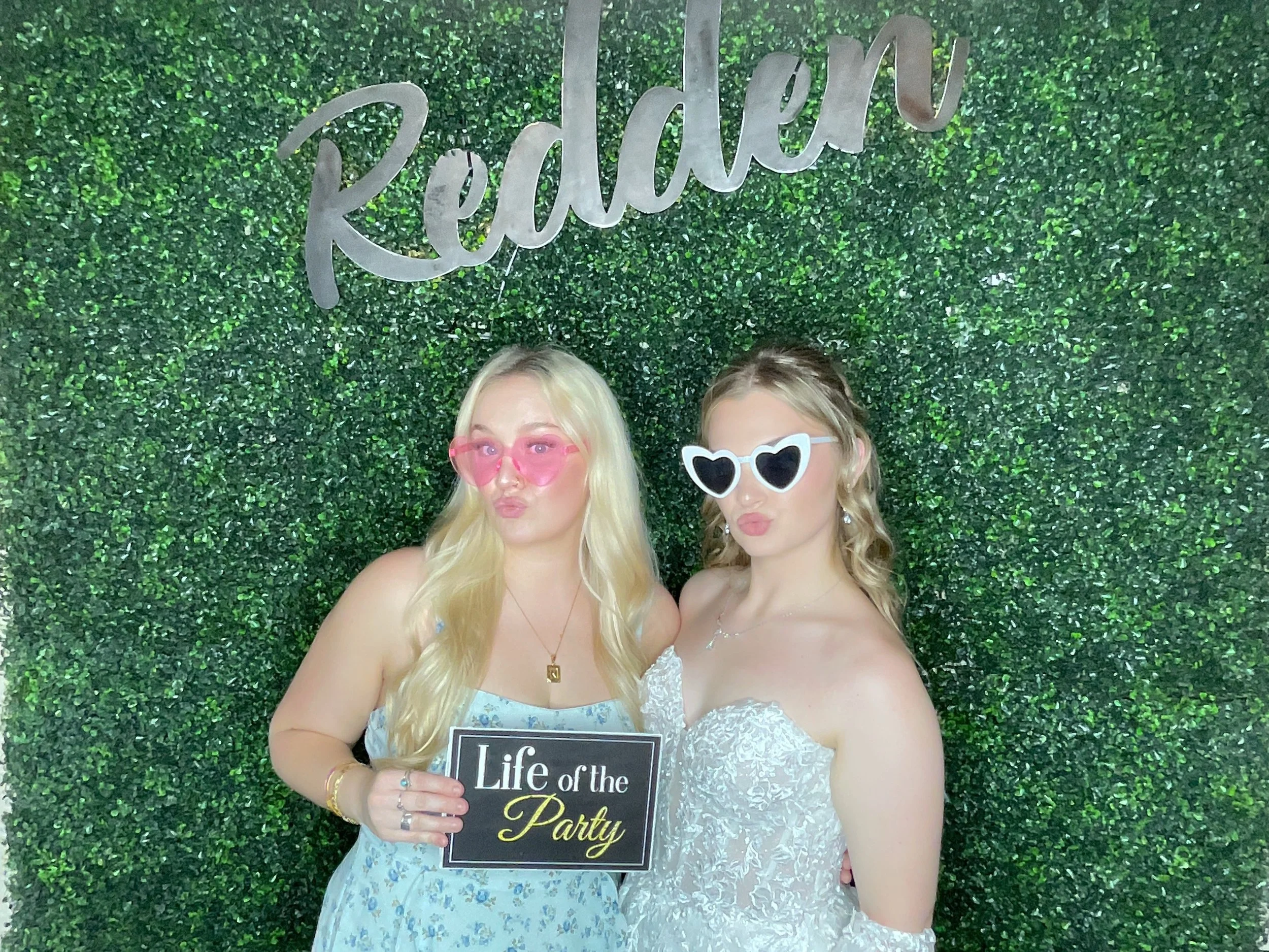Friends having fun with CheesyPix at an event