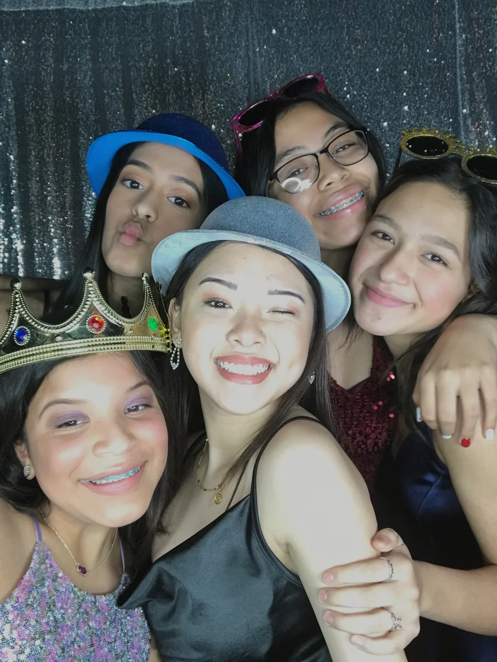 Guests posing together at a CheesyPix social photo booth