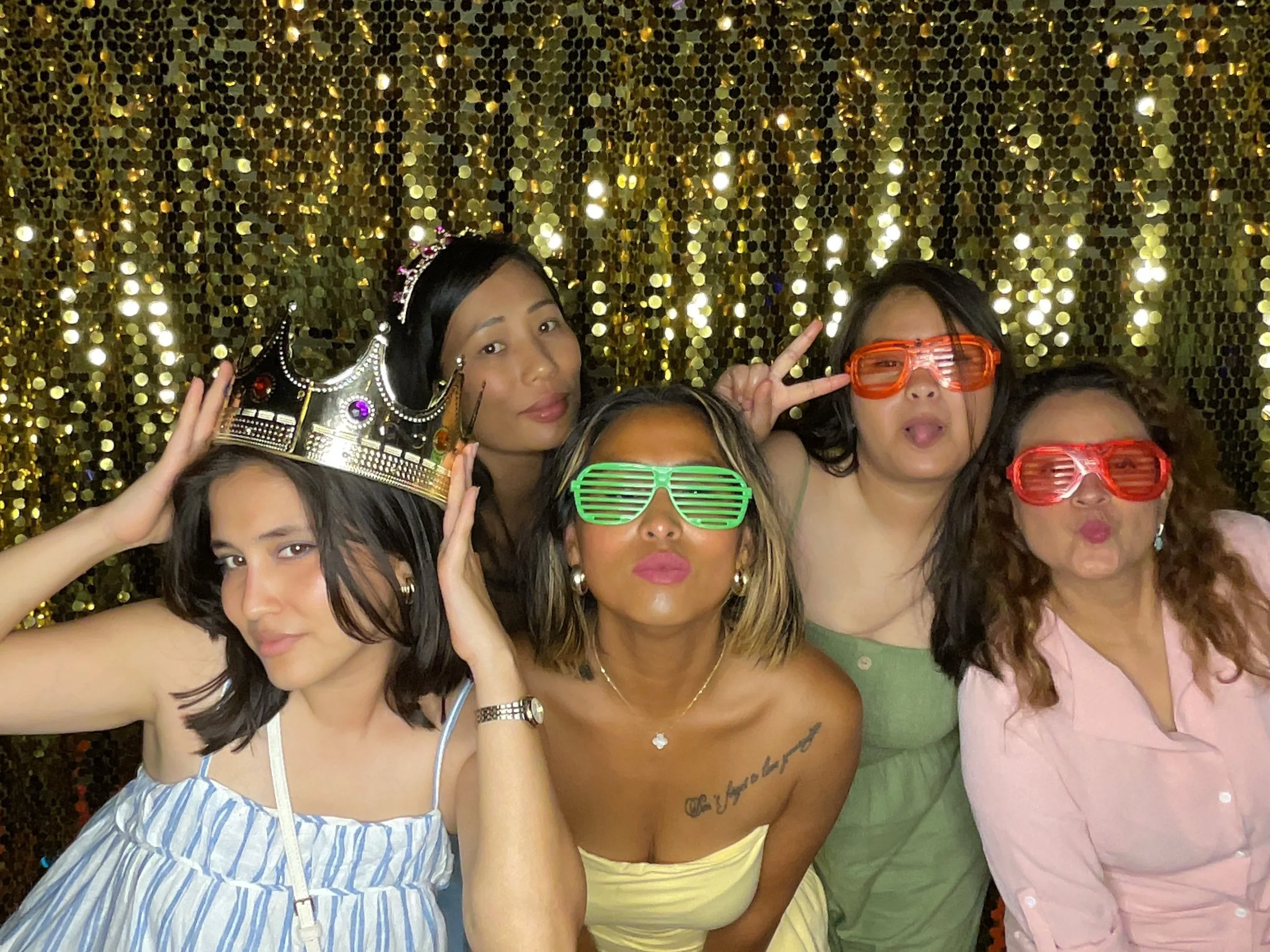 Friends celebrating together at a CheesyPix quinceañera photo booth