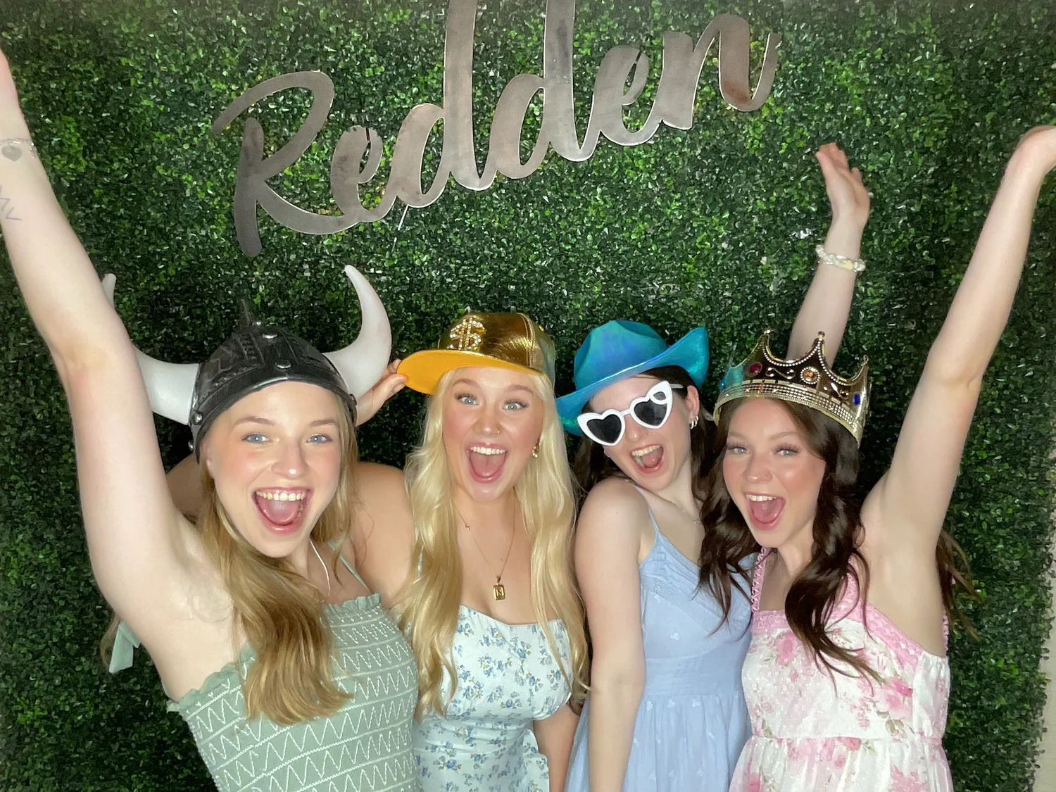 Guests having fun at a CheesyPix digital photo booth