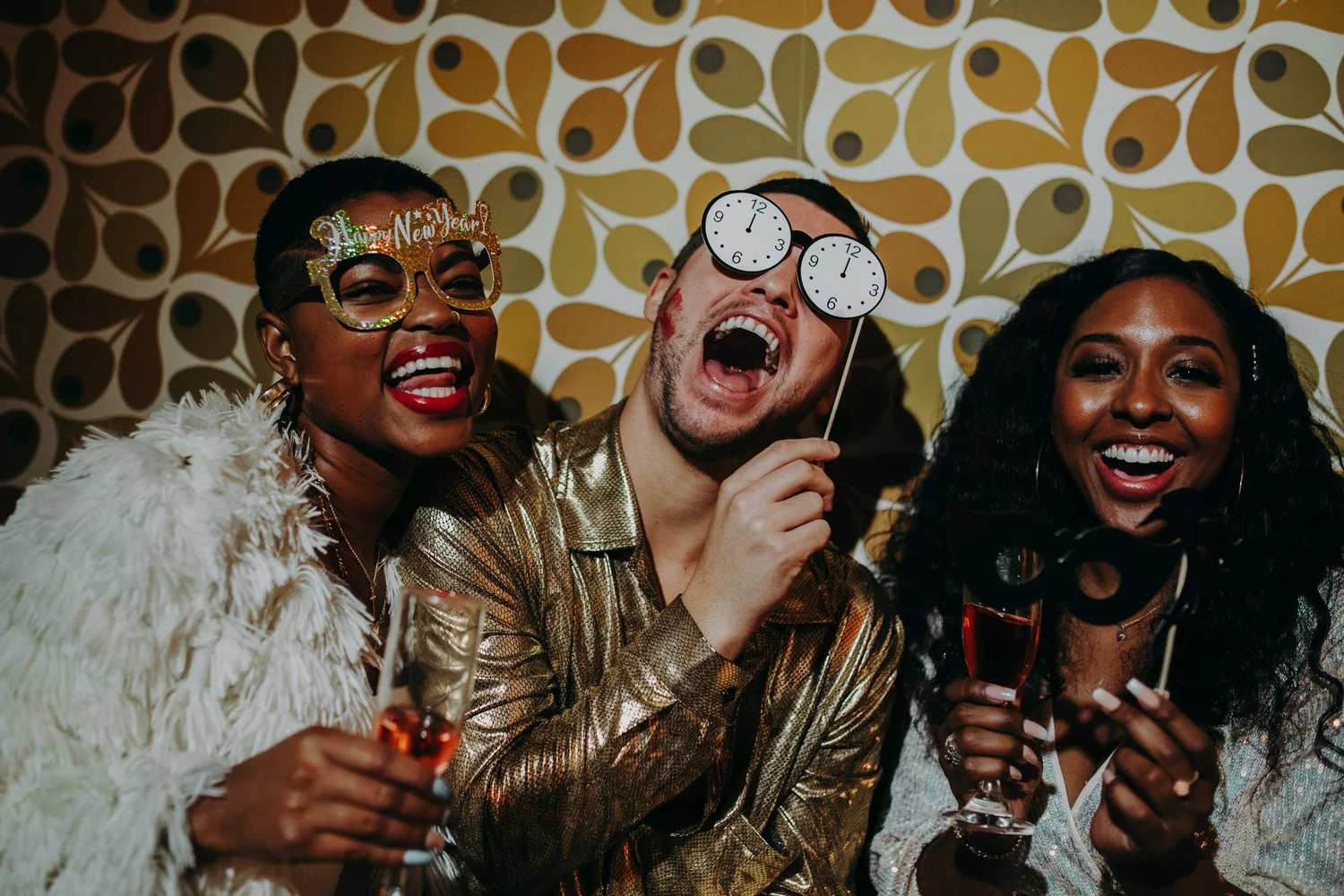 Friends laughing together at a celebration