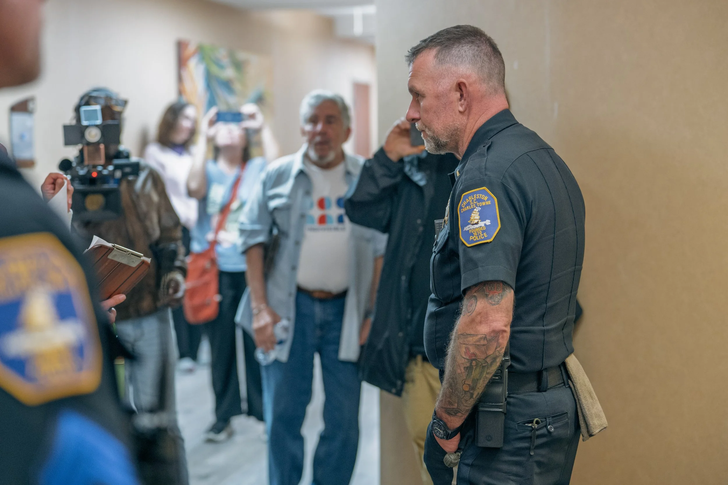Names on a Clipboard, Officers in the Hall