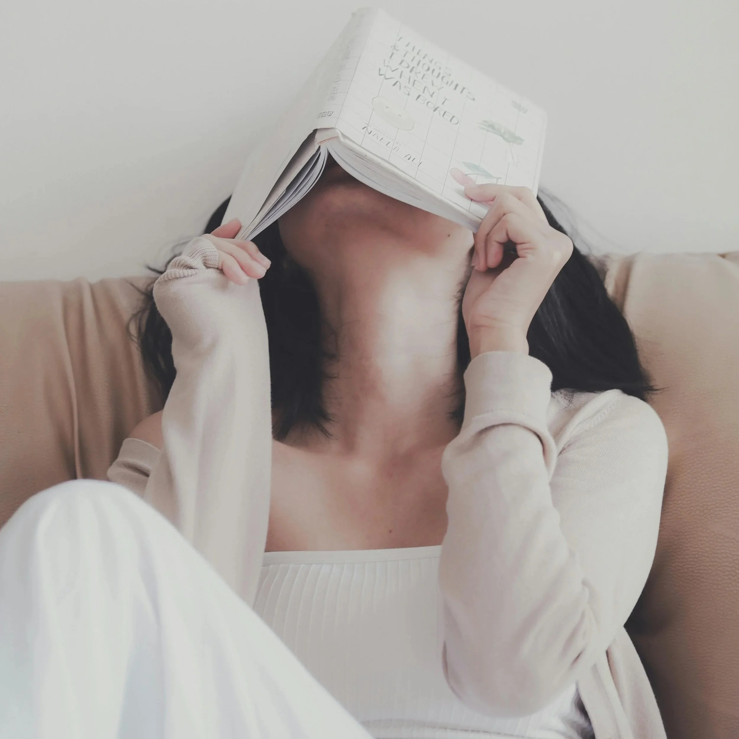 Person feeling overwhelmed while seeking neurodivergent support for ADHD, autism, and sensory challenges