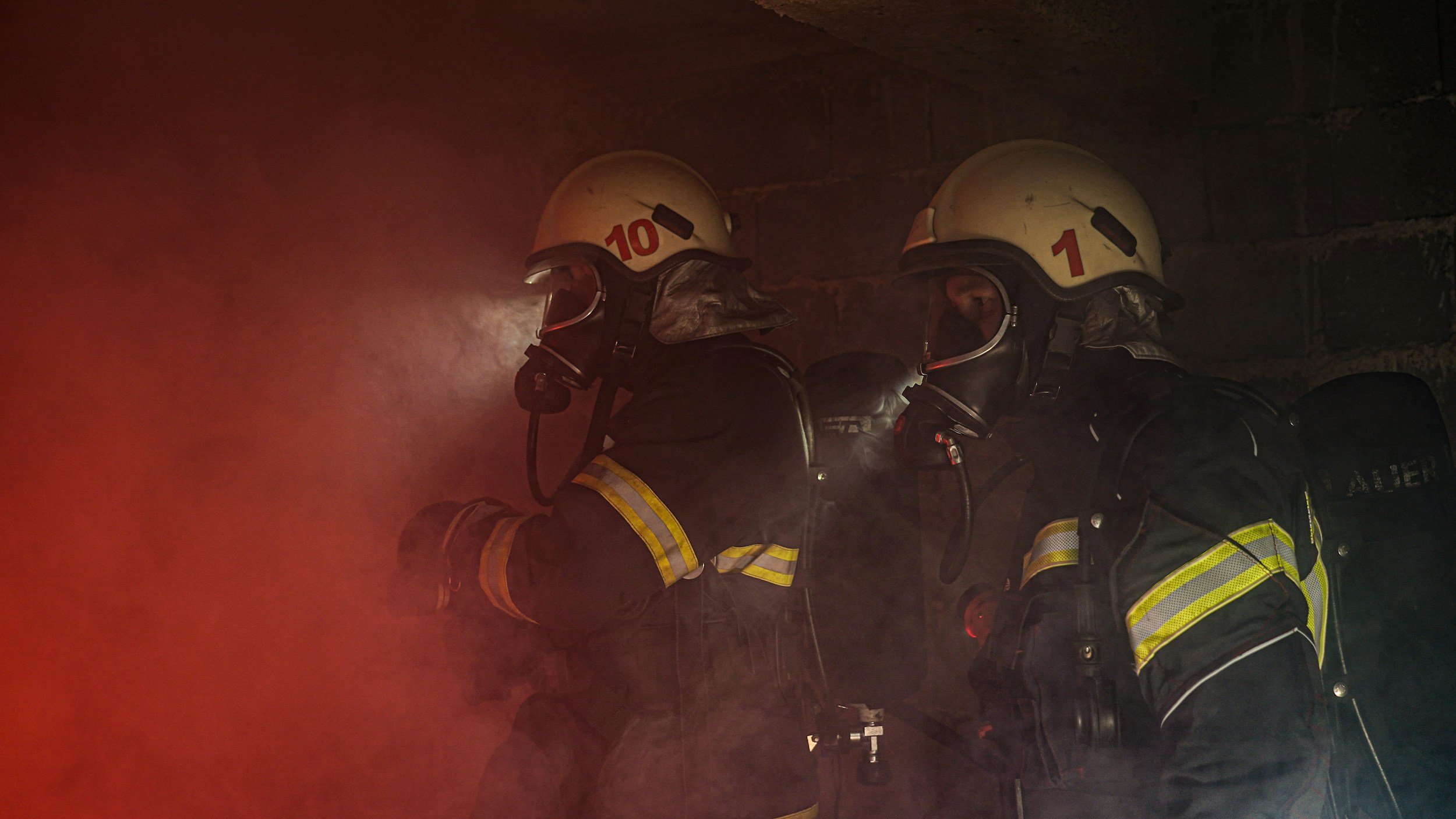 Firefighters in protective gear representing therapy and mental health support for first responders