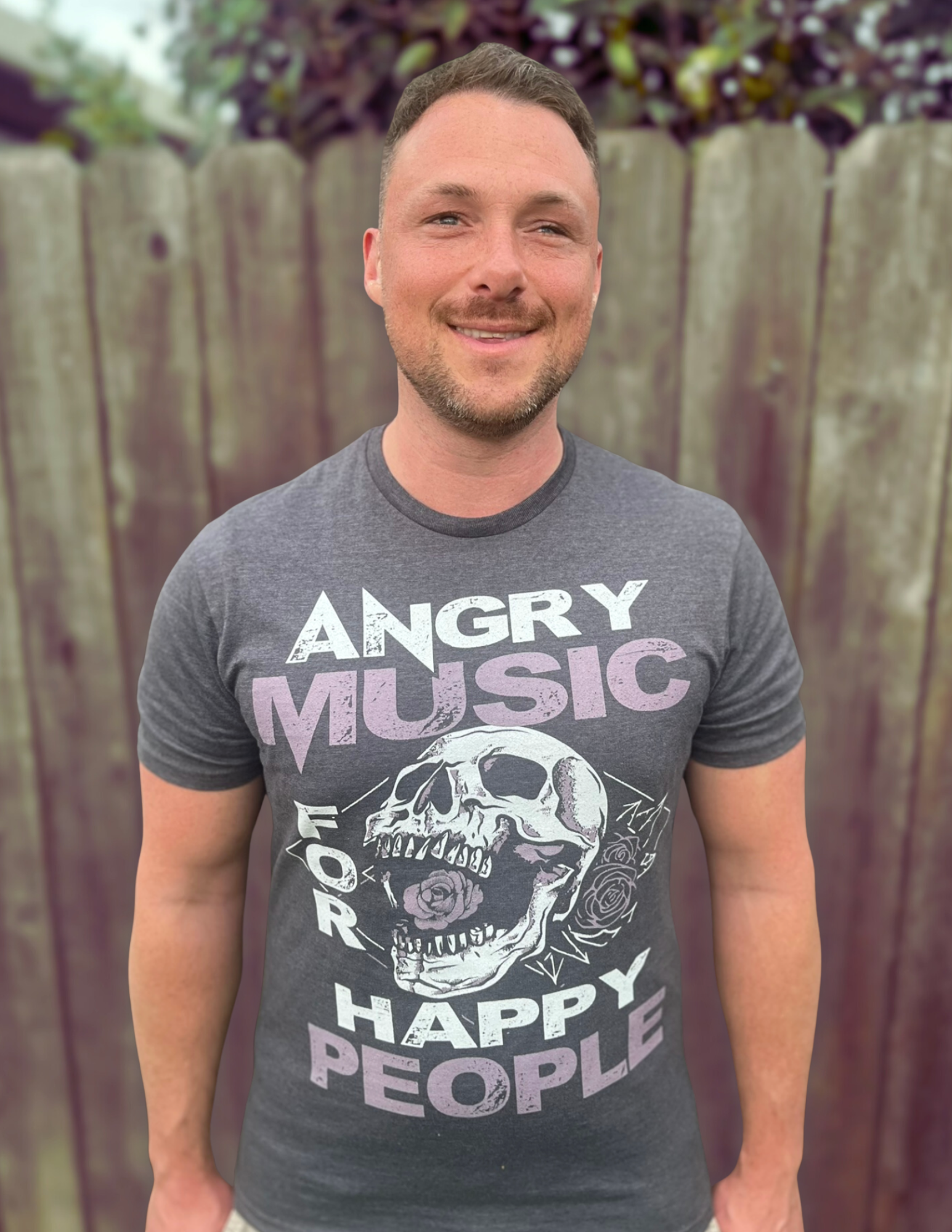 Devin Peck, APCC, psychotherapist, smiling in a light blue collared shirt against a white background.