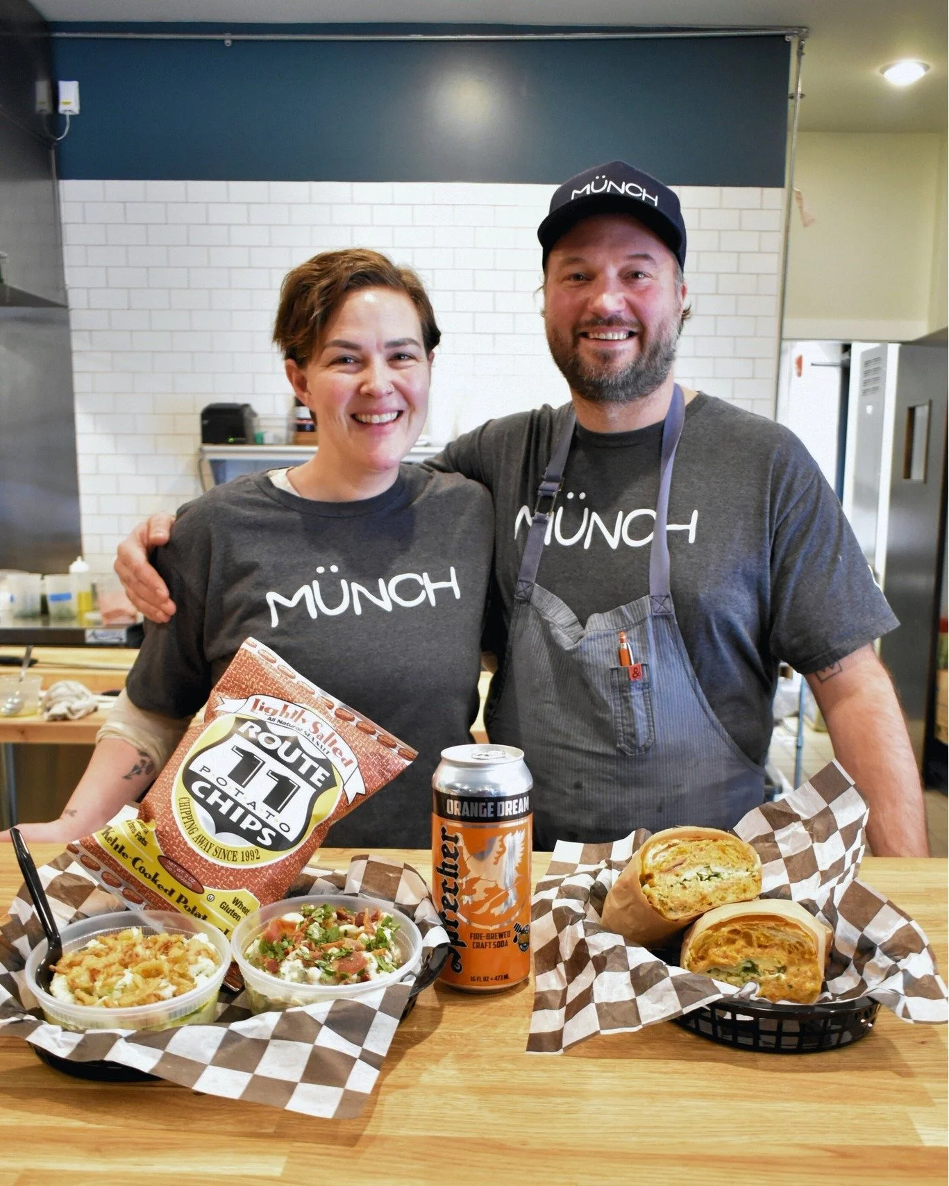Happy grand opening day to @munch_harrisonburg! Stop by 122 S Main St #103 in Harrisonburg for sandwiches, salads, and snacks, and meet owners Emily Imgram, a former teacher and caterer, and Doug Weiler, a classically trained chef and former owner of