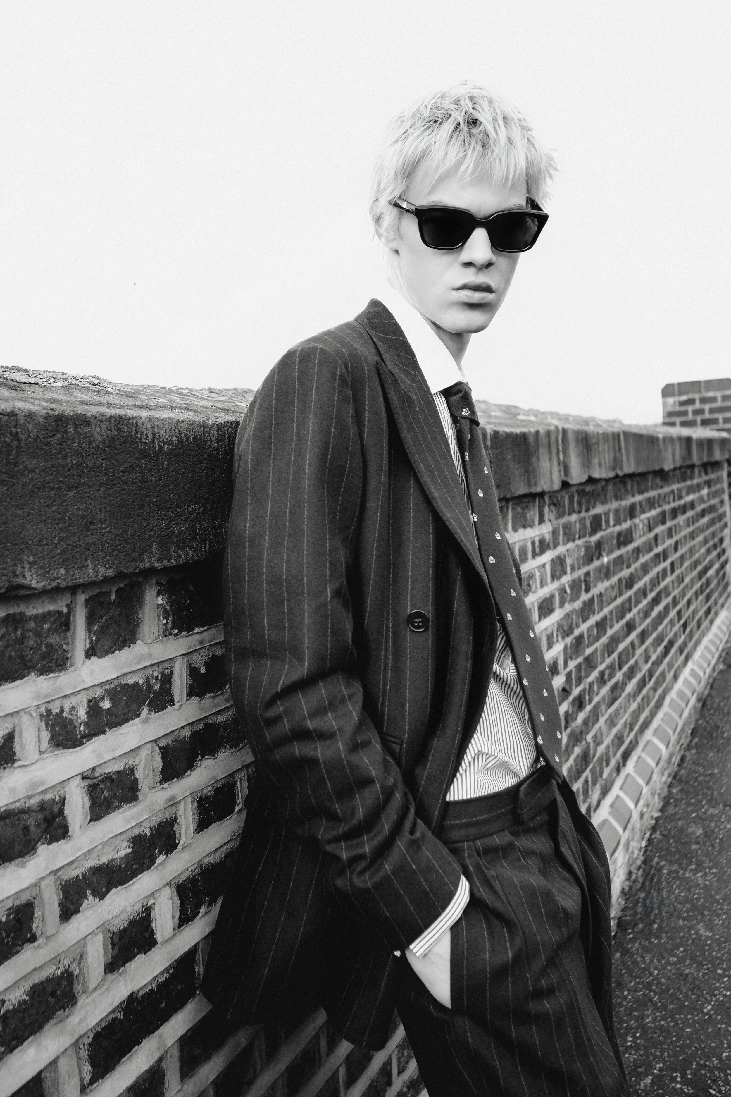 Editorial fashion portrait in suit from Numéro Switzerland Rebel Code photographed in London by Ori Paul Levi