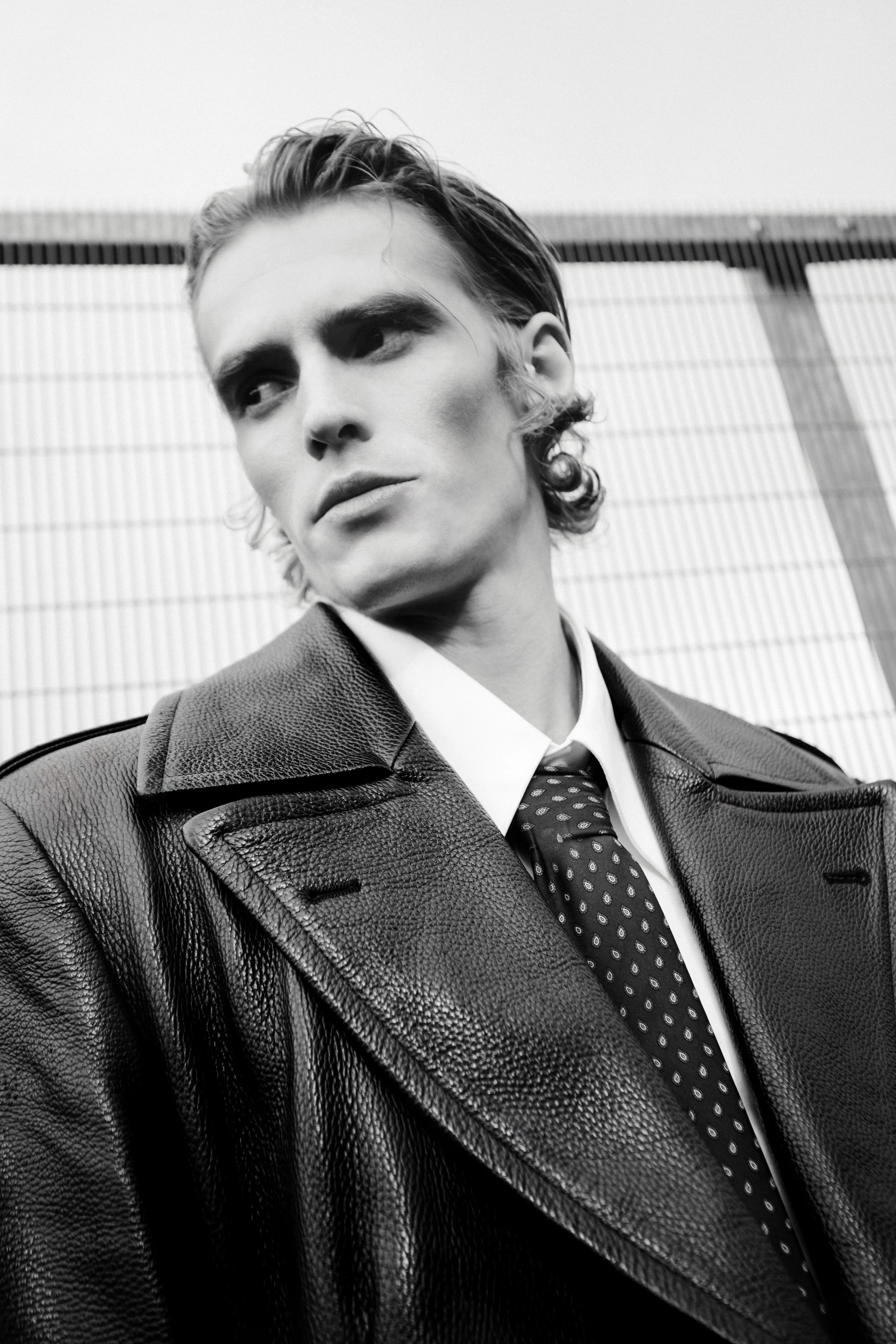 Male fashion portrait from Numéro Switzerland editorial Rebel Code photographed by Ori Paul Levi