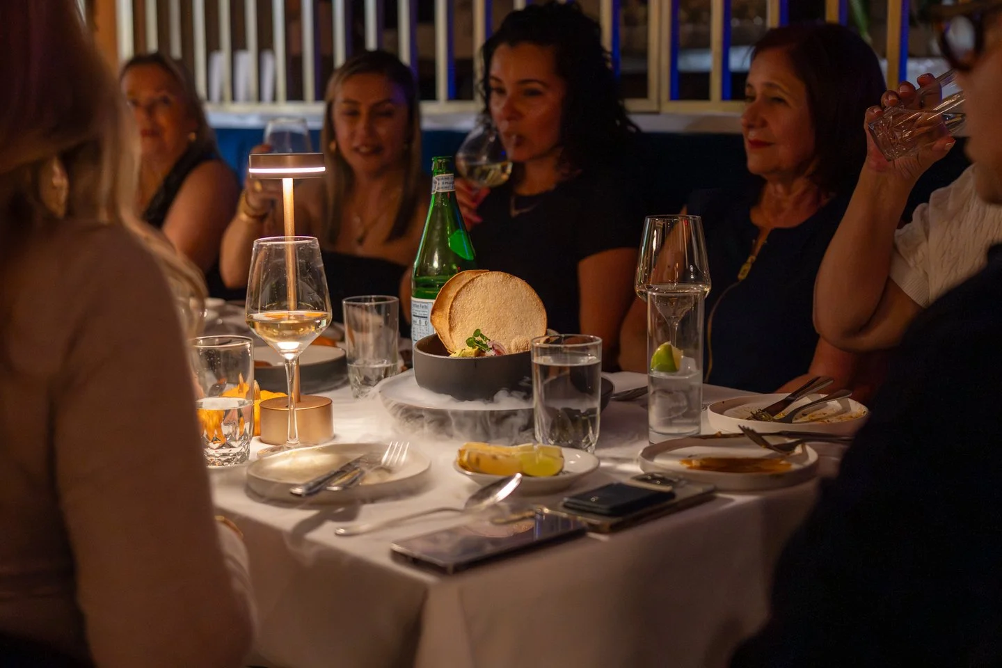 group of friends having dinner at palermo gramercy