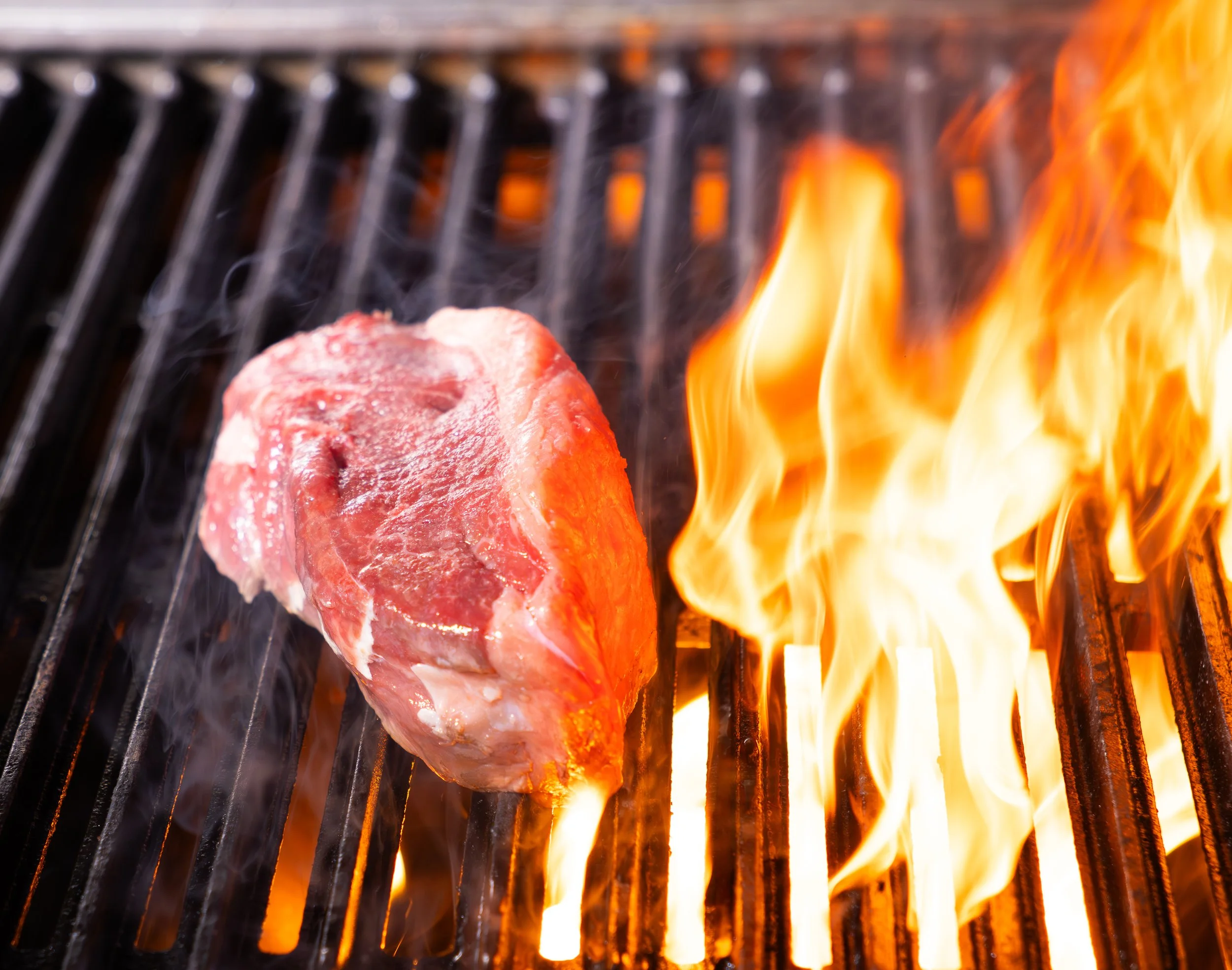 steak cooking in the grill