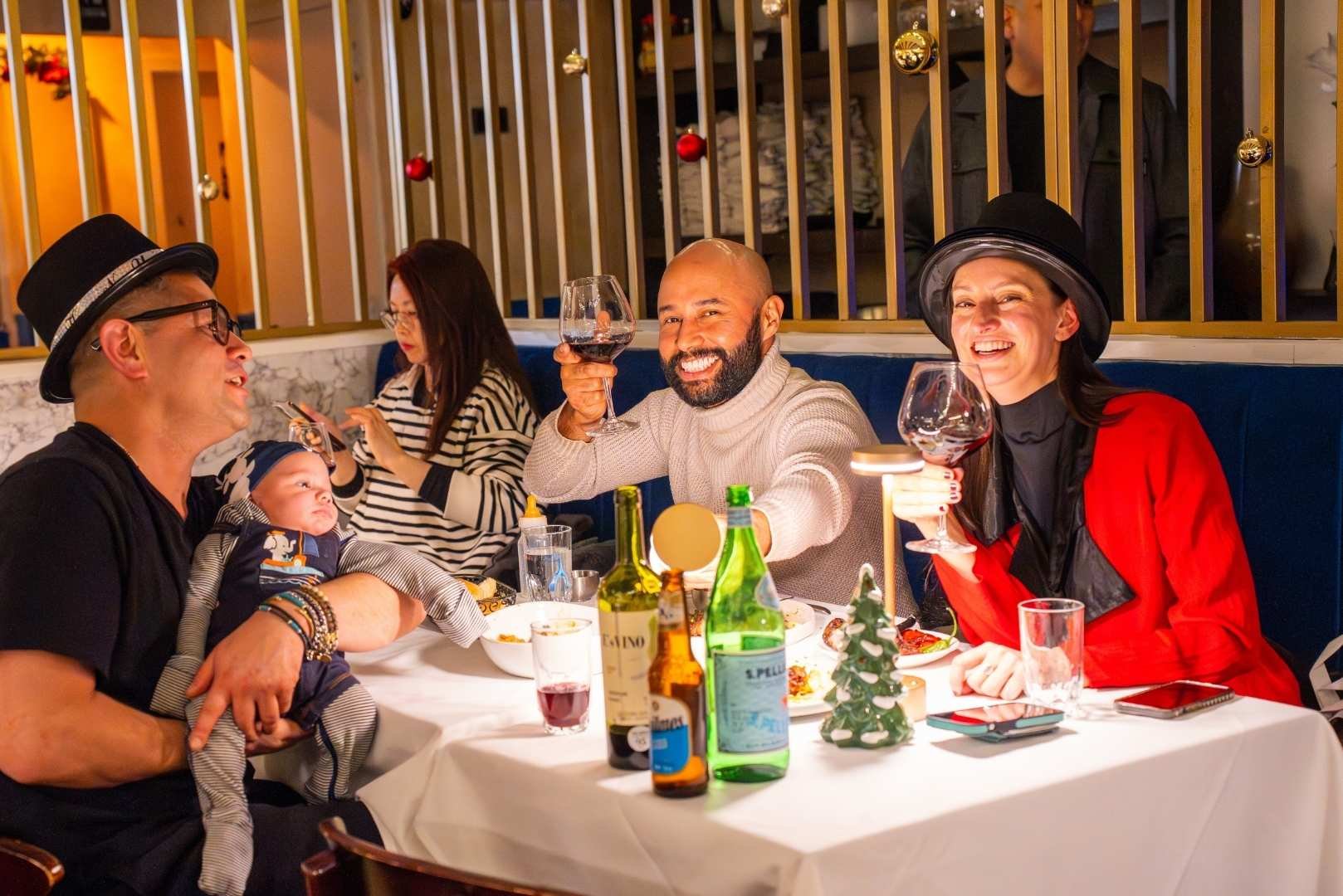 people having dinner with a baby
