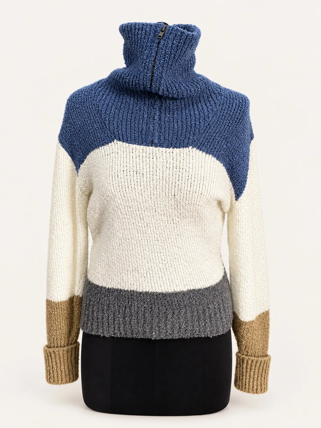 Navy, ivory and taupe colour-block quarter-zip knit sweater with a high collar, displayed on a dress form.