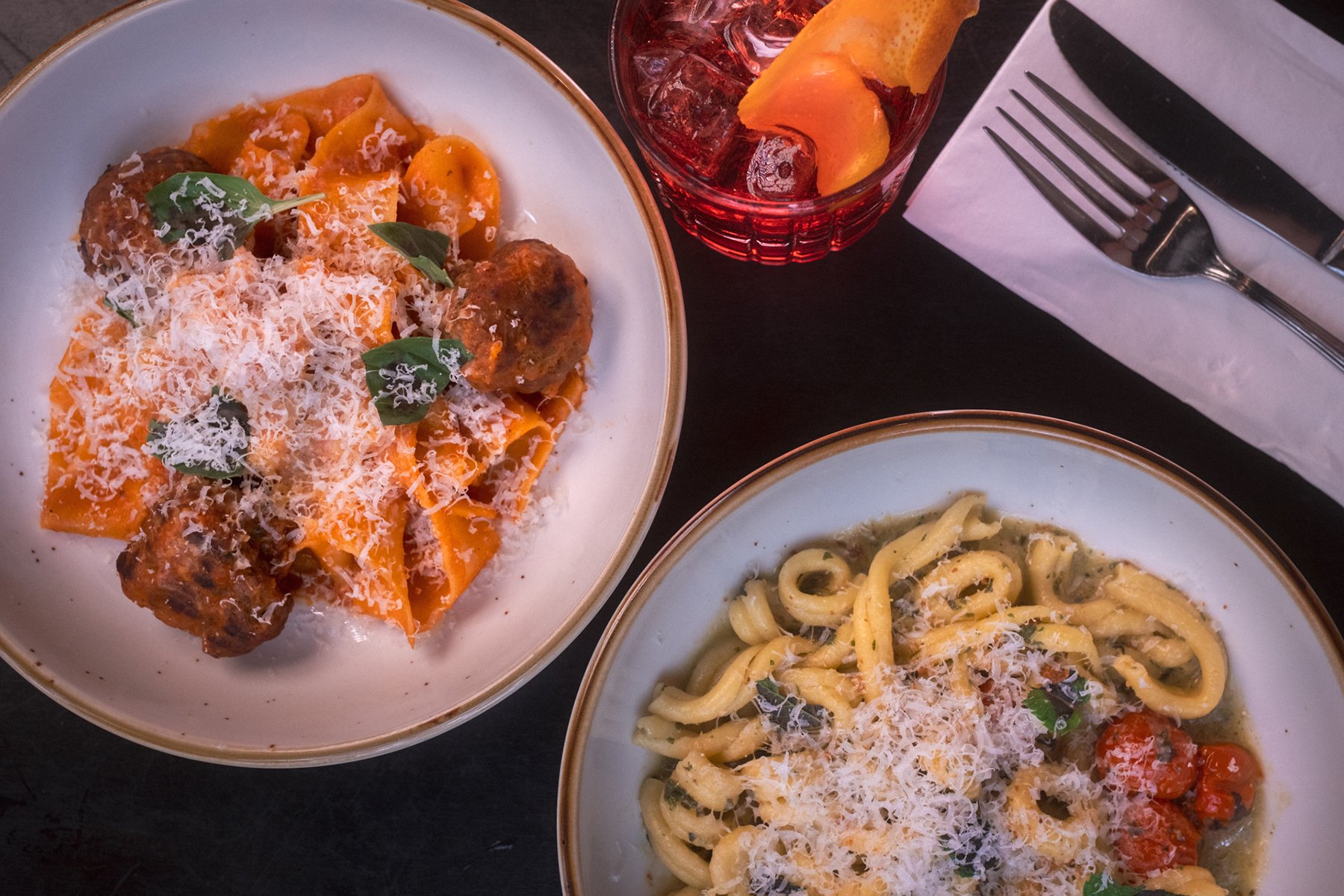 Darkalino's pasta pomodoro and pesto with best negroni in Seattle.