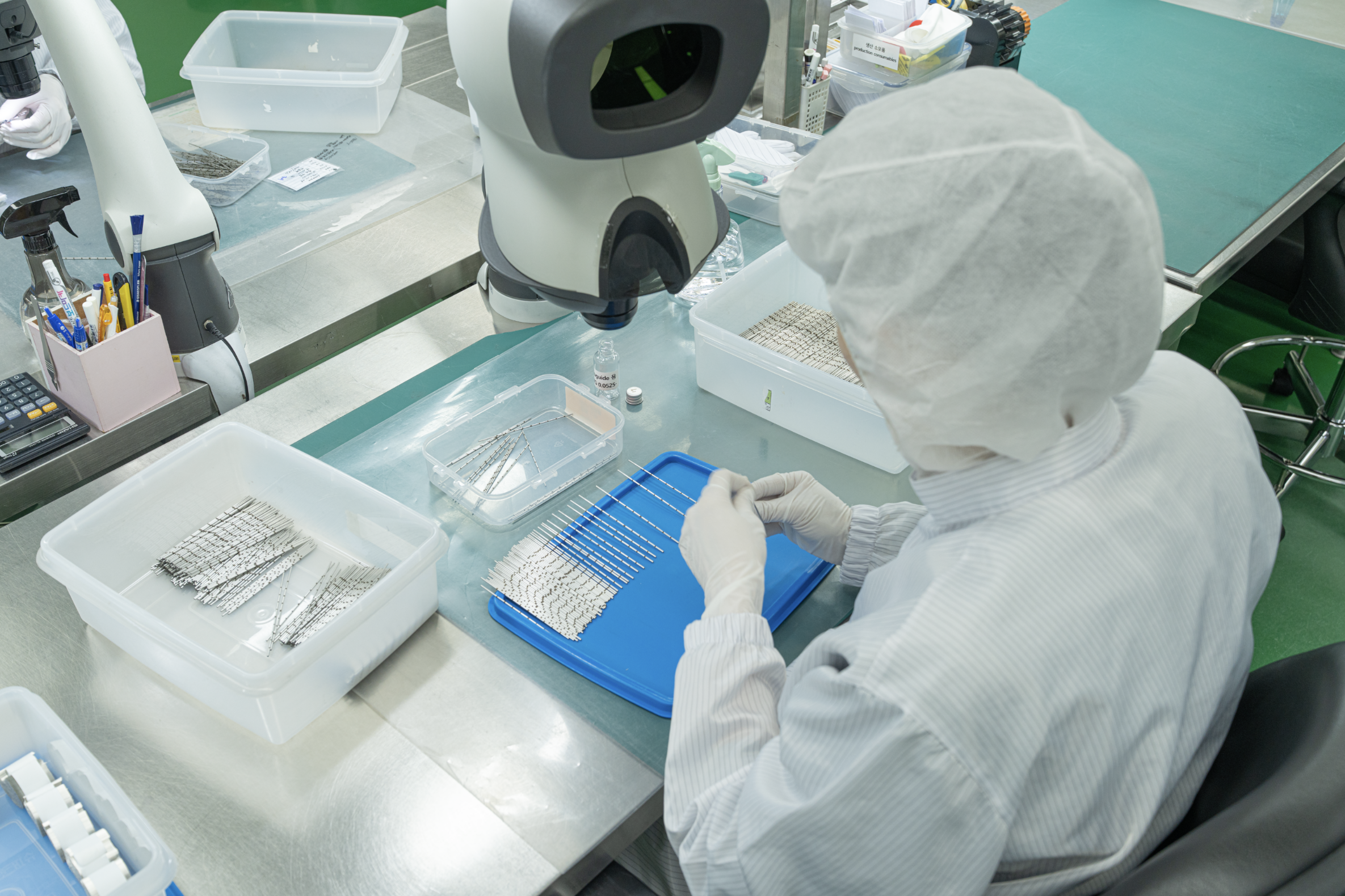 Medical device manufacturing process involving engineering, development, precision production, and regulatory compliance.
