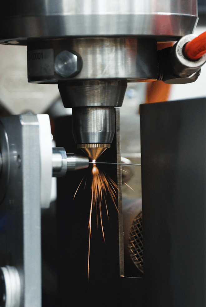 Precision machining of a metal component during the medical device manufacturing process.