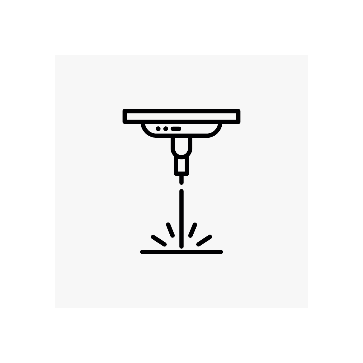 Black and white icon of a laser cutter machine emitting a focused beam onto a surface, surrounded by a white background.