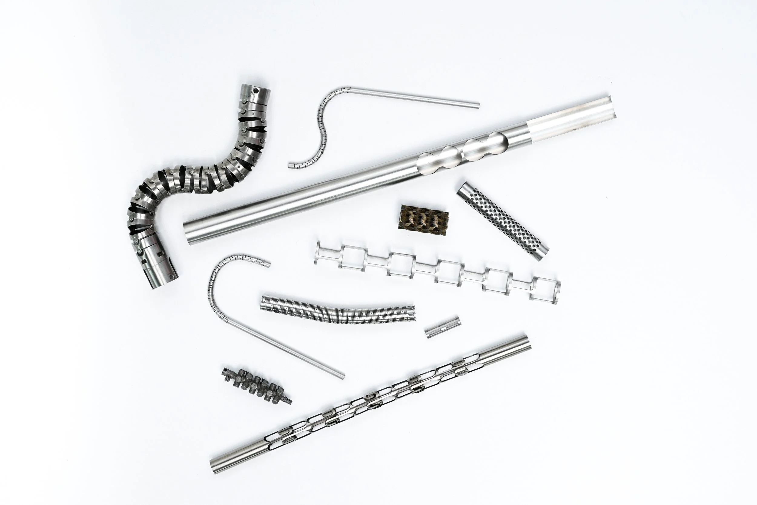 Specialized medical device components including procedural needles, tubular components, and precision sub-assemblies.