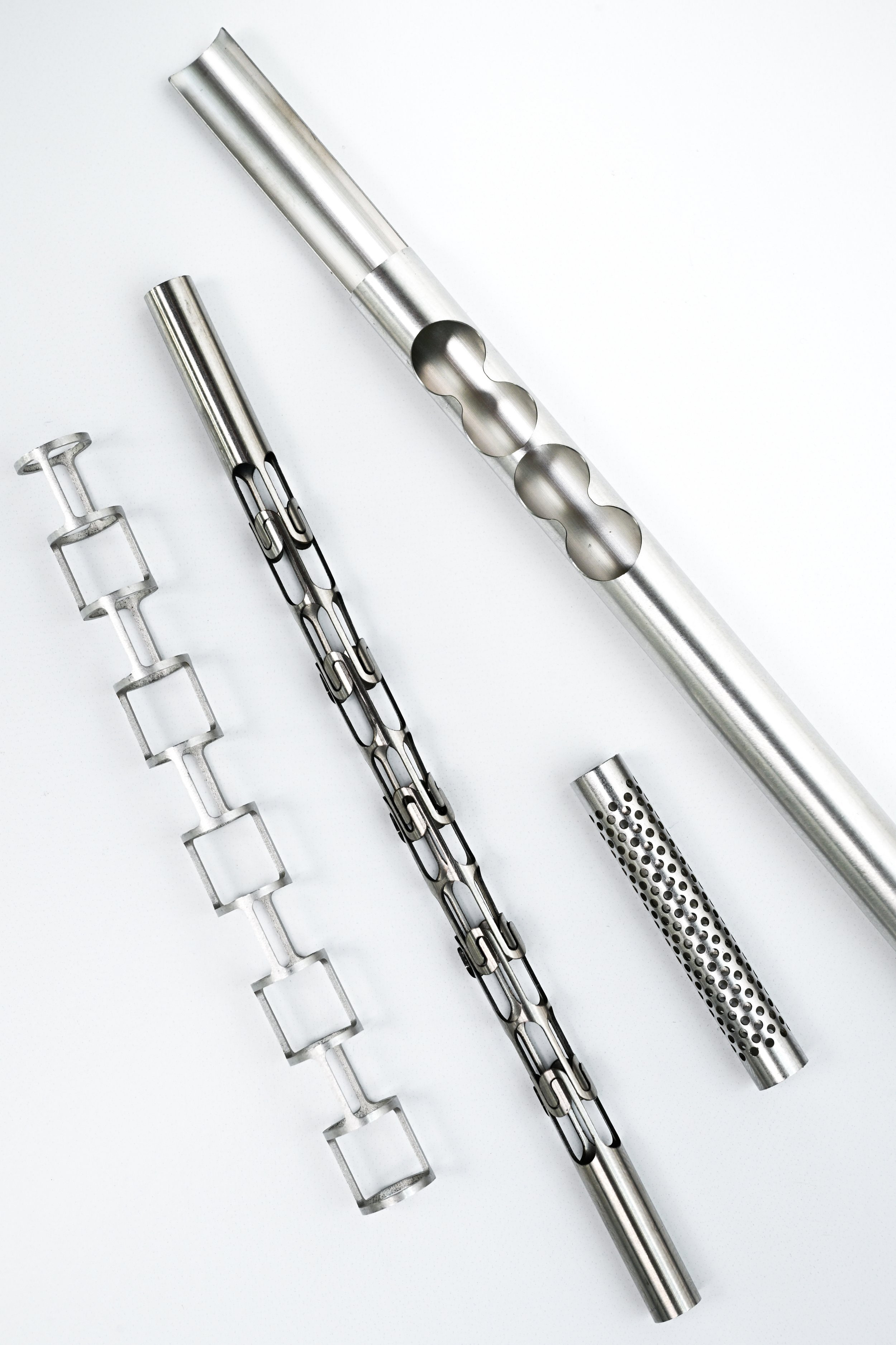 Laser-cut tubular medical components with complex precision features and geometries.