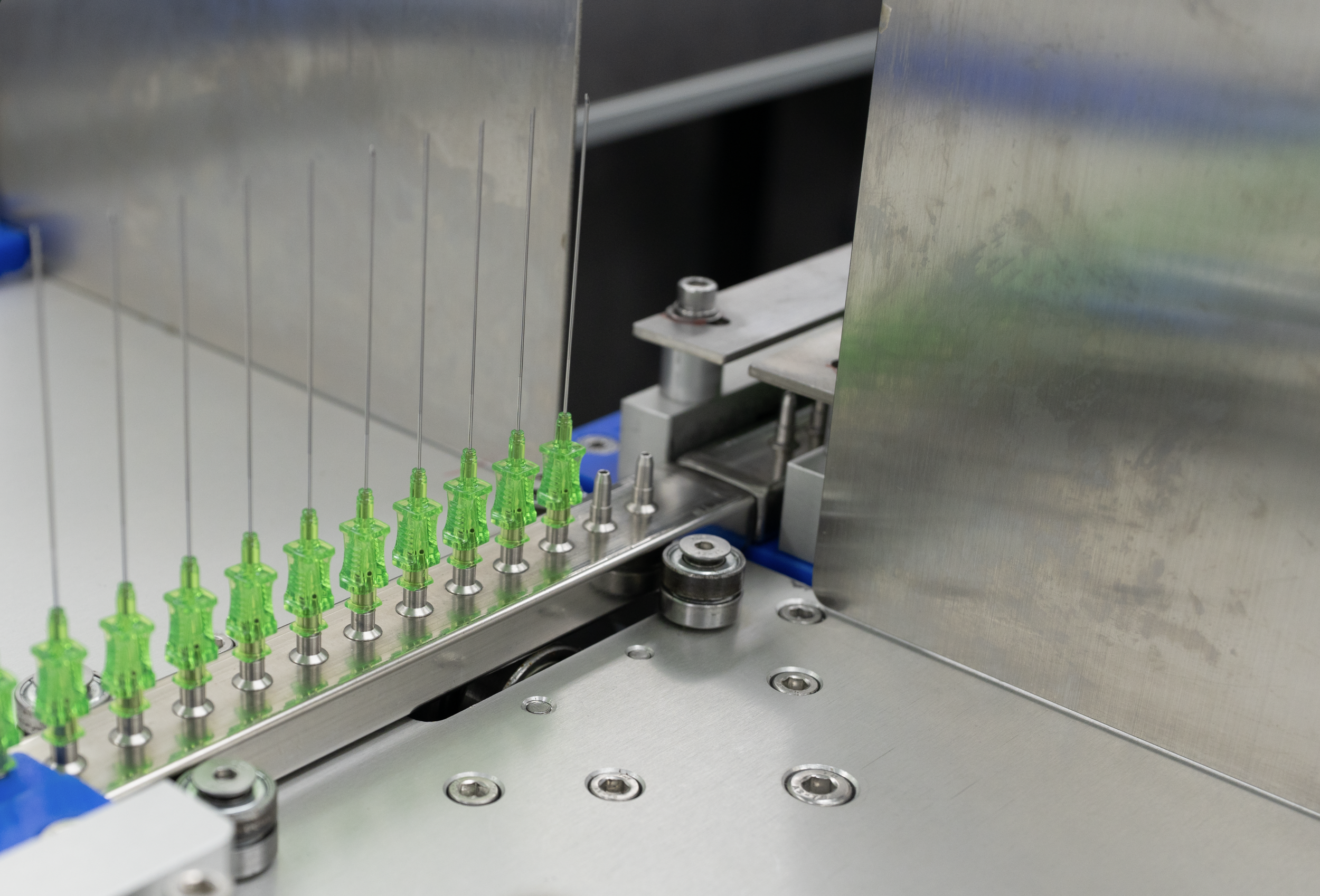 Custom medical needle design and manufacturing with specialized materials, coatings, geometries, and configurations.