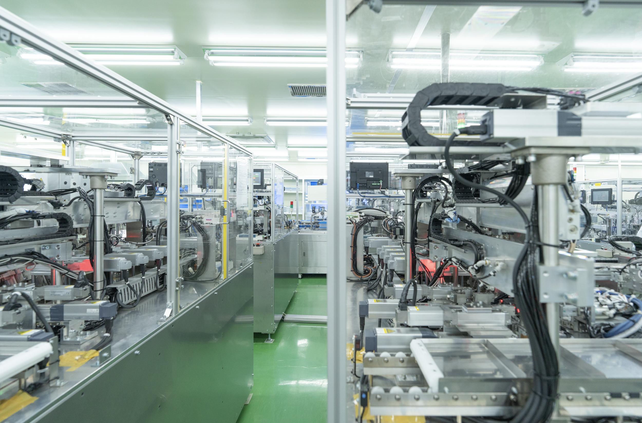 Automated manufacturing equipment supporting scalable medical device component production.
