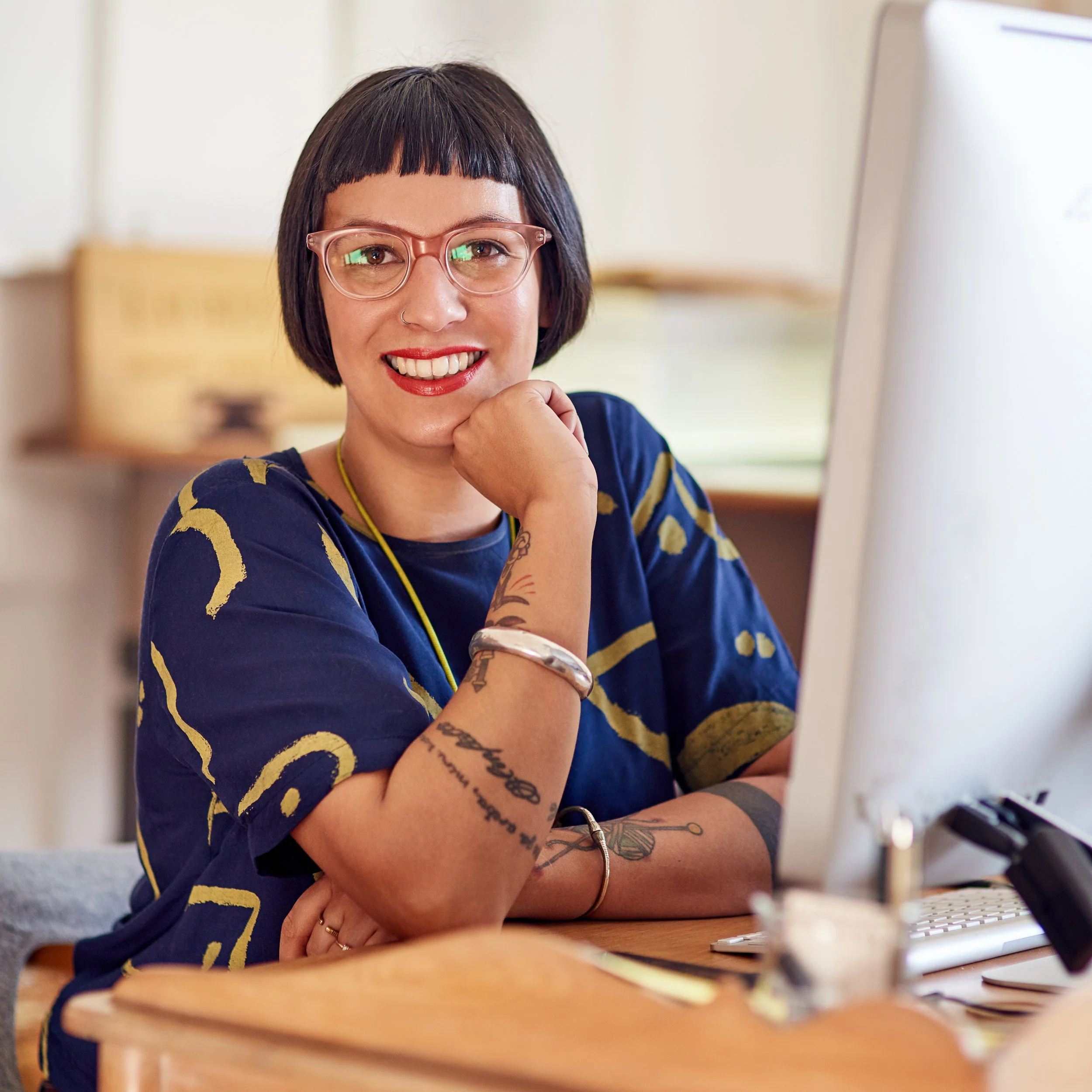 Image of a focused mental health provider working at a computer, representing downloadable clinical tools, paperwork templates, and training resources available through Guidance Teletherapy’s Provider Resources
