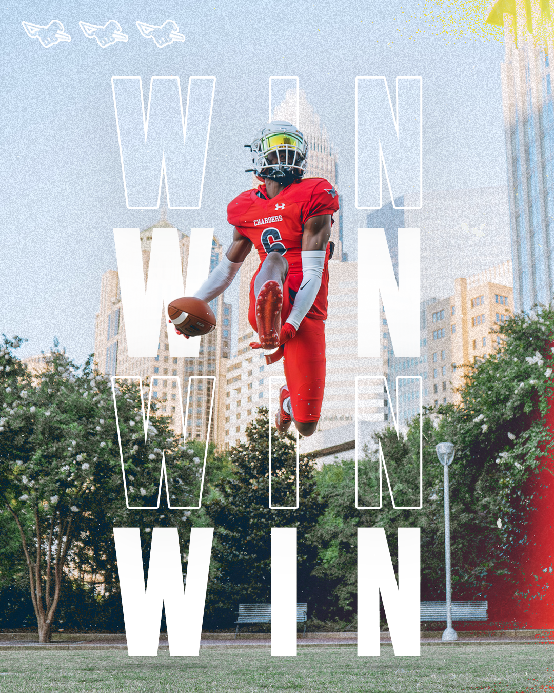 Football player wearing red uniform and helmet, jumping in park with a football in hand. "WIN WIN WIN" text is overlaid. City buildings and trees in the background.
