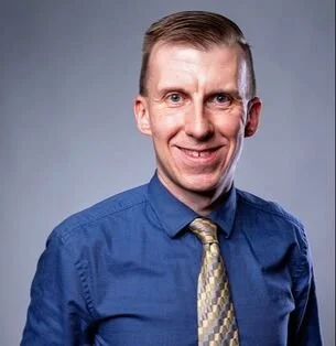 Headshot of Adam Zinkievich