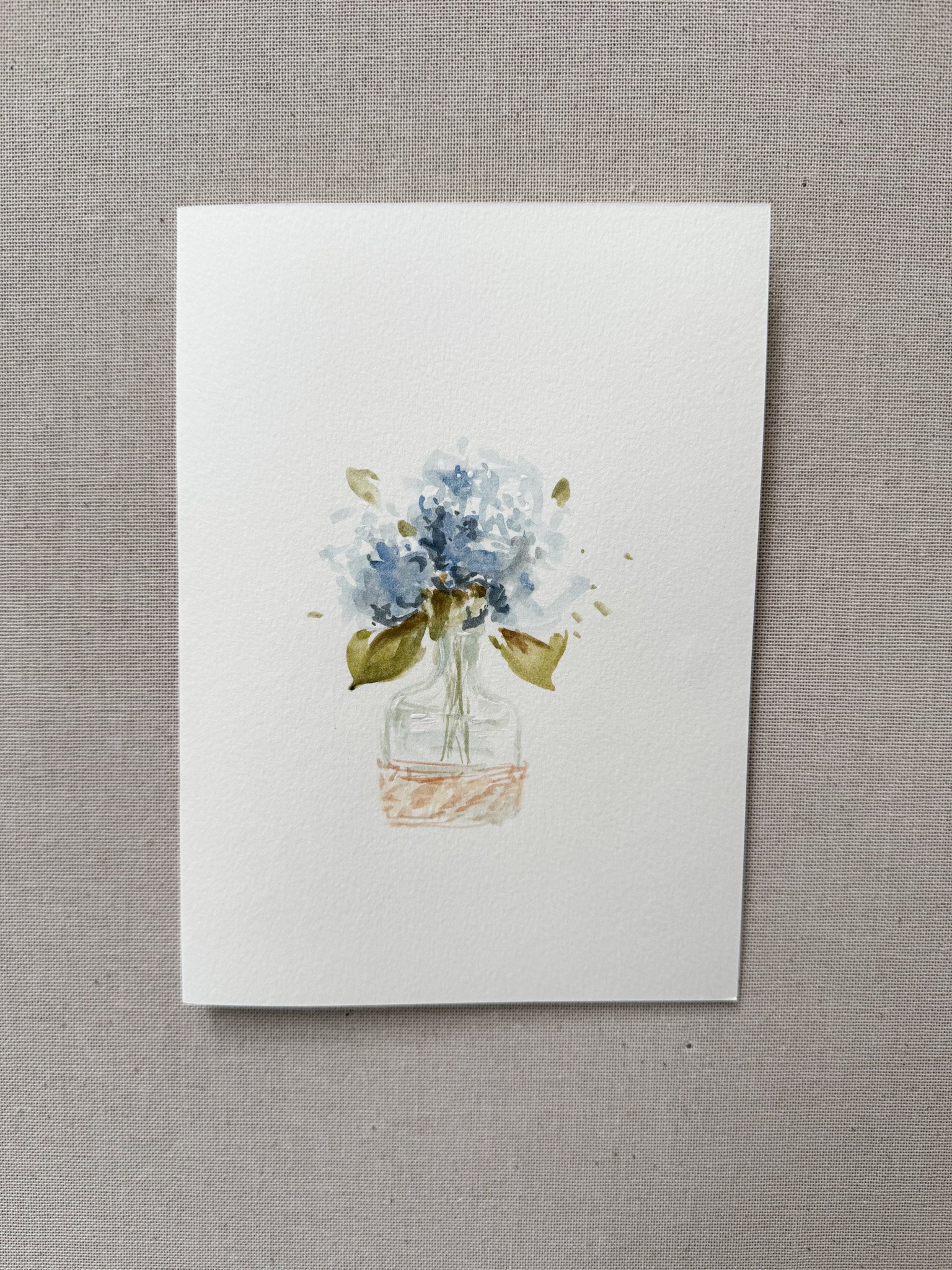 Hydrangeas in a glass vase.jpg