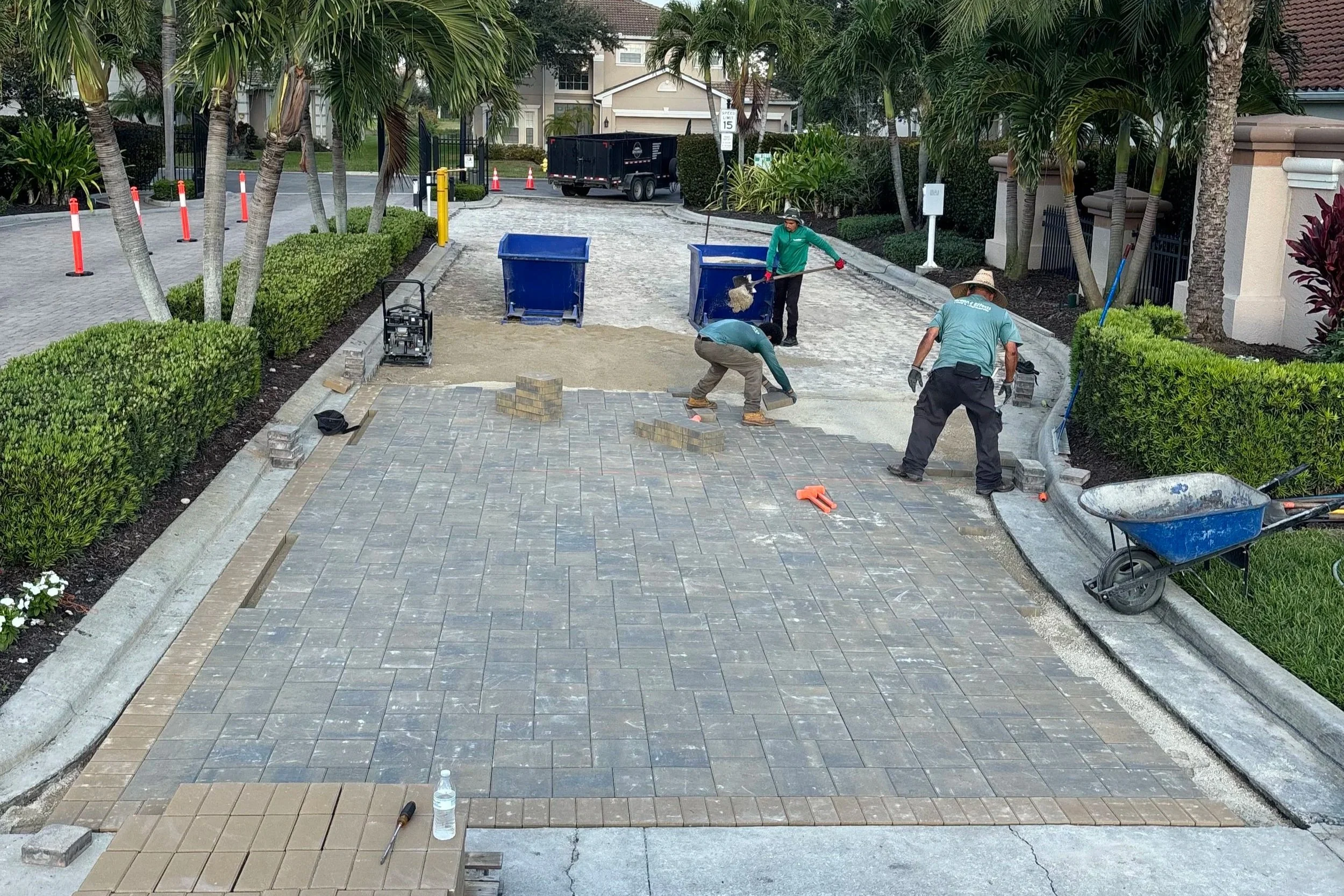 Turf and paver design. Interlocking paver in white/charcoal. Landscape design. Unique paver designs.