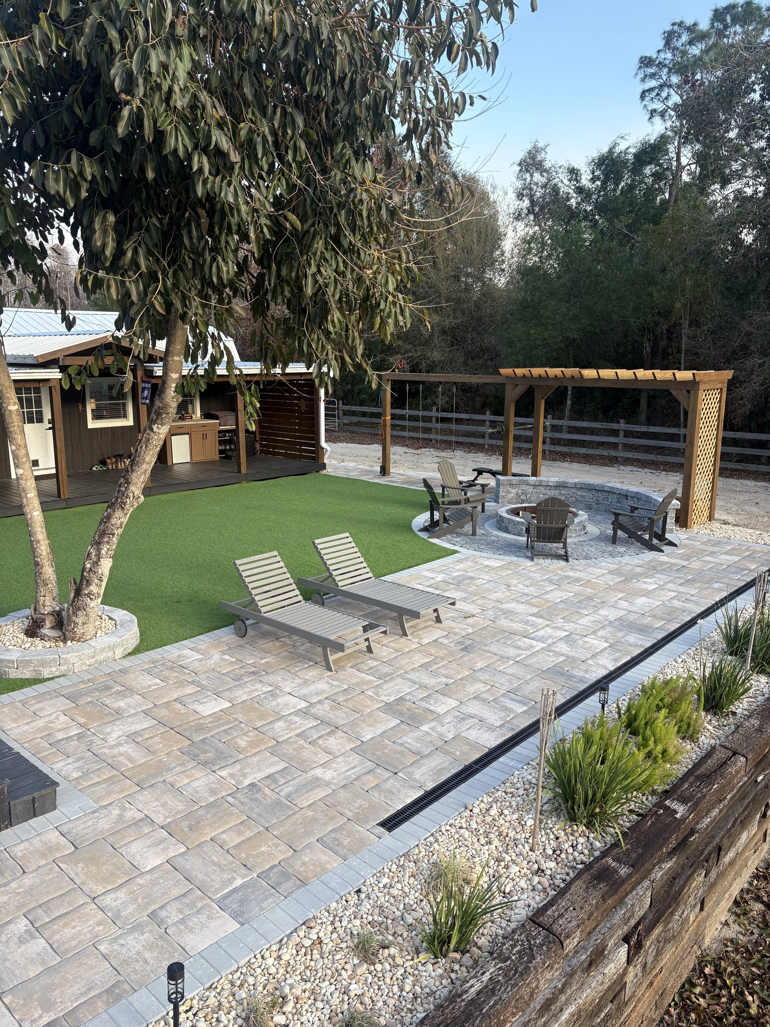 backyard design. pavers. pergola. fire pit. sundeck